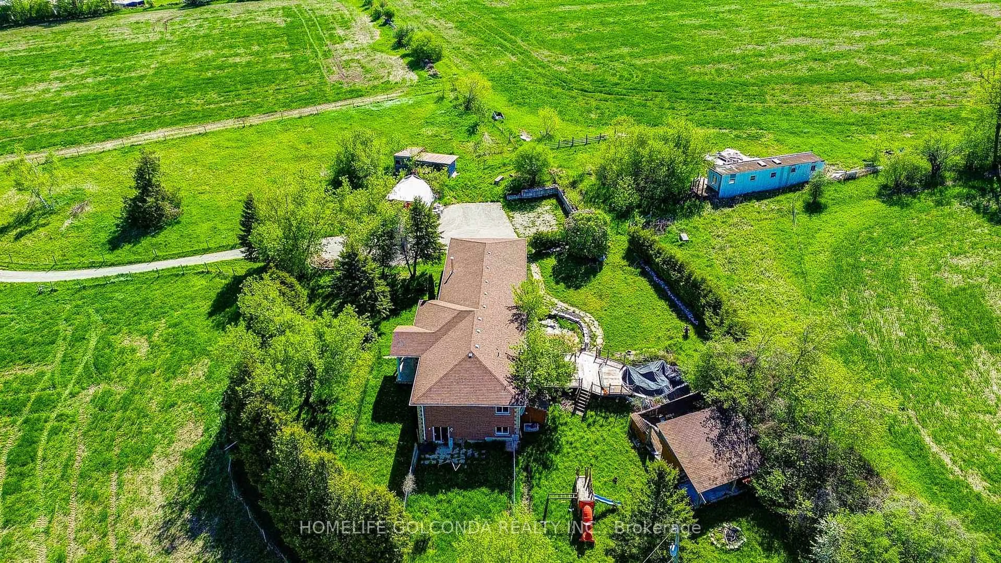 A pic from outside/outdoor area/front of a property/back of a property/a pic from drone, street for 1680 Hwy 7, Brock Ontario L0C 1H0