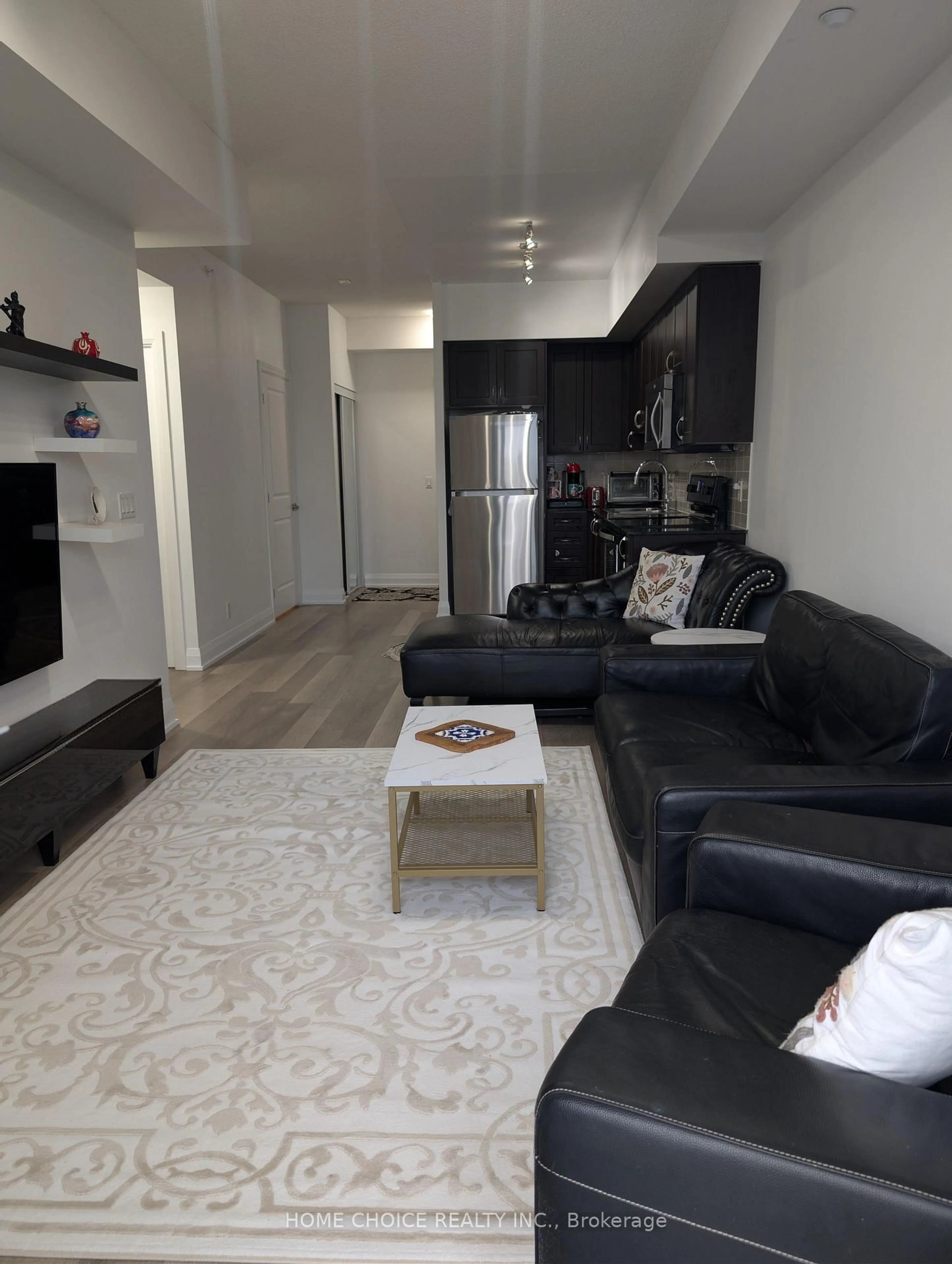 Living room with furniture, wood/laminate floor for 372 Highway 7 East Rd #1009, Richmond Hill Ontario L4B 0C6