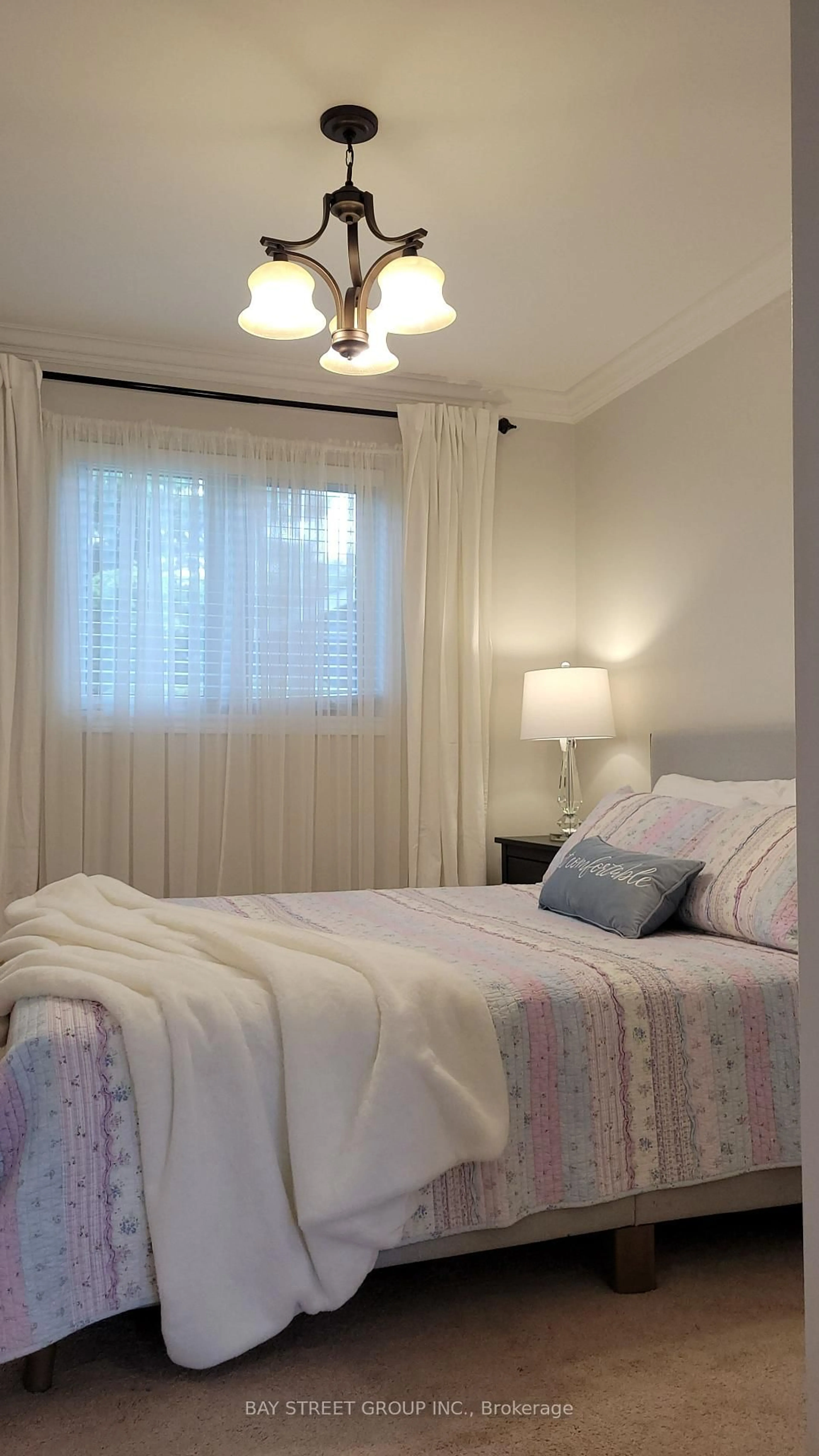 Bedroom with bed, wood/laminate floor for 722A Lake Dr, Georgina Ontario L4P 1V1