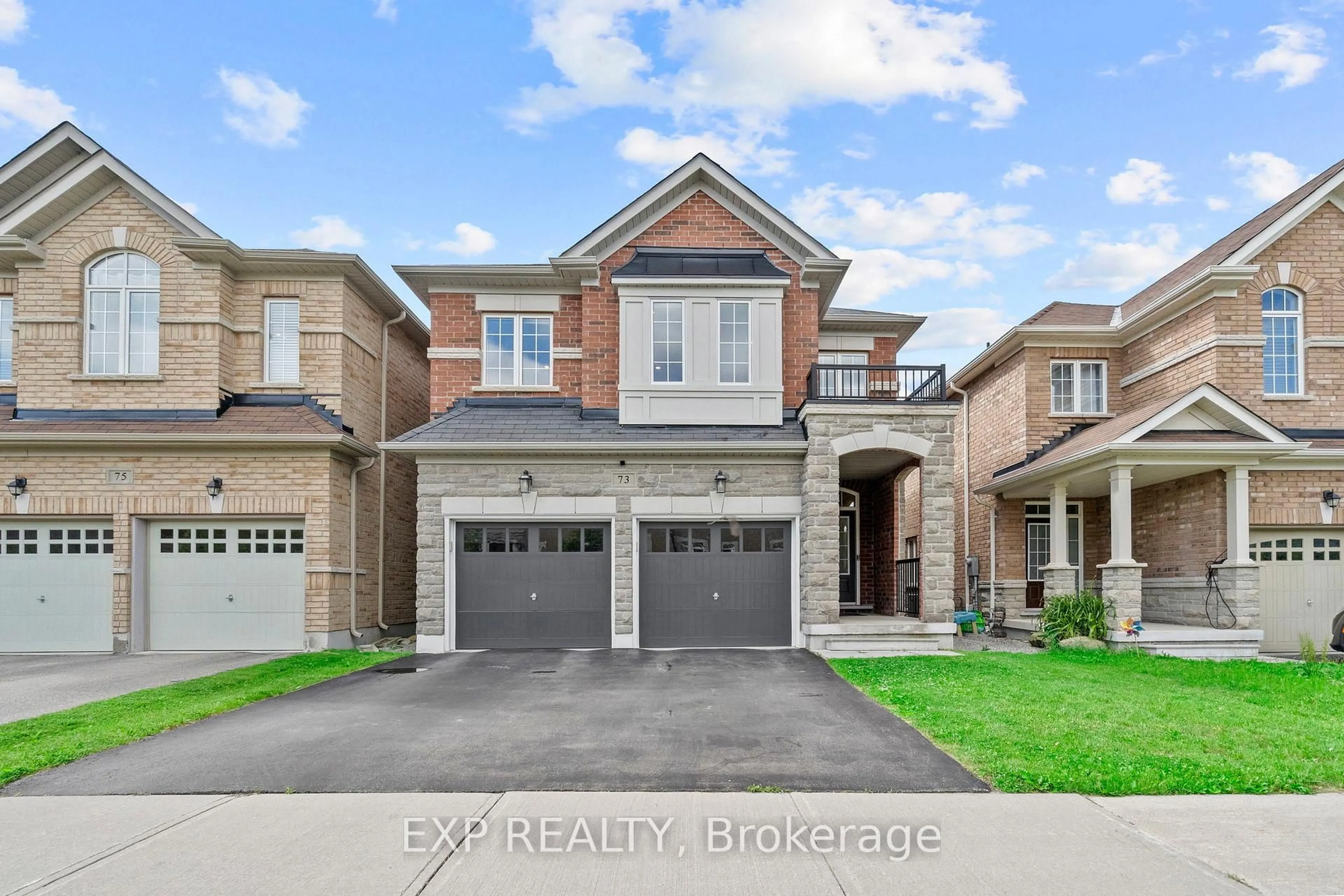 Home with brick exterior material, street for 73 Riding Mountain Dr, Richmond Hill Ontario L4E 0V3