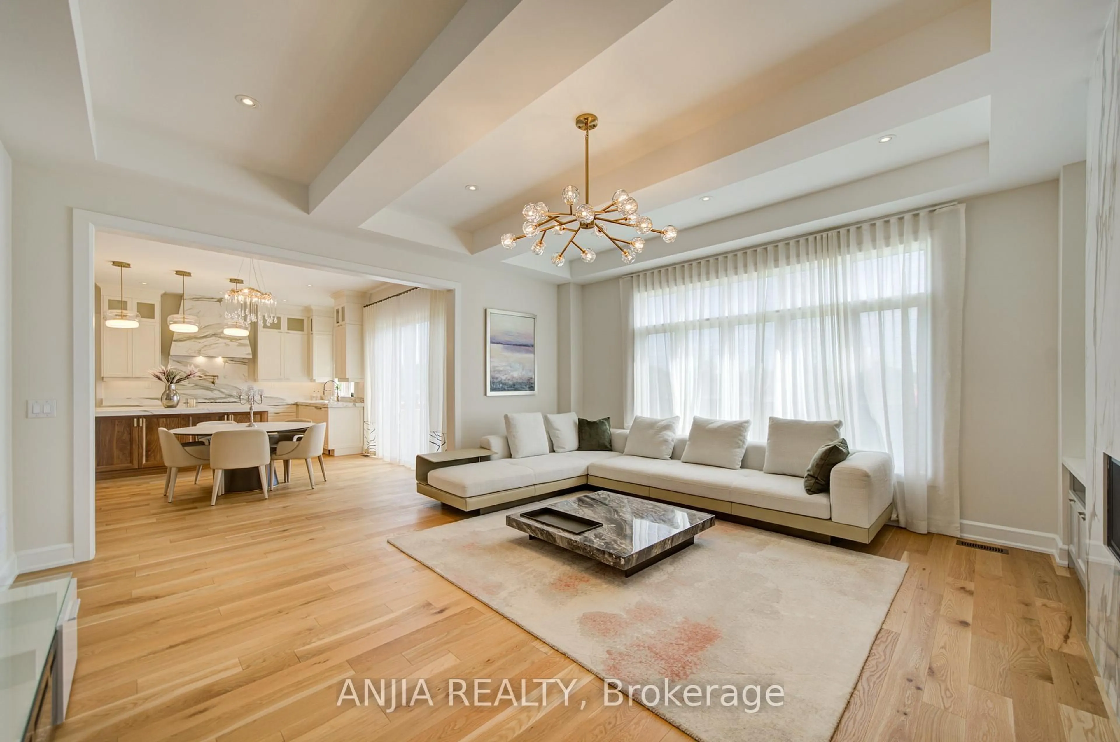 Living room with furniture, wood/laminate floor for 67 Keatley Dr, Vaughan Ontario L6A 4Y3