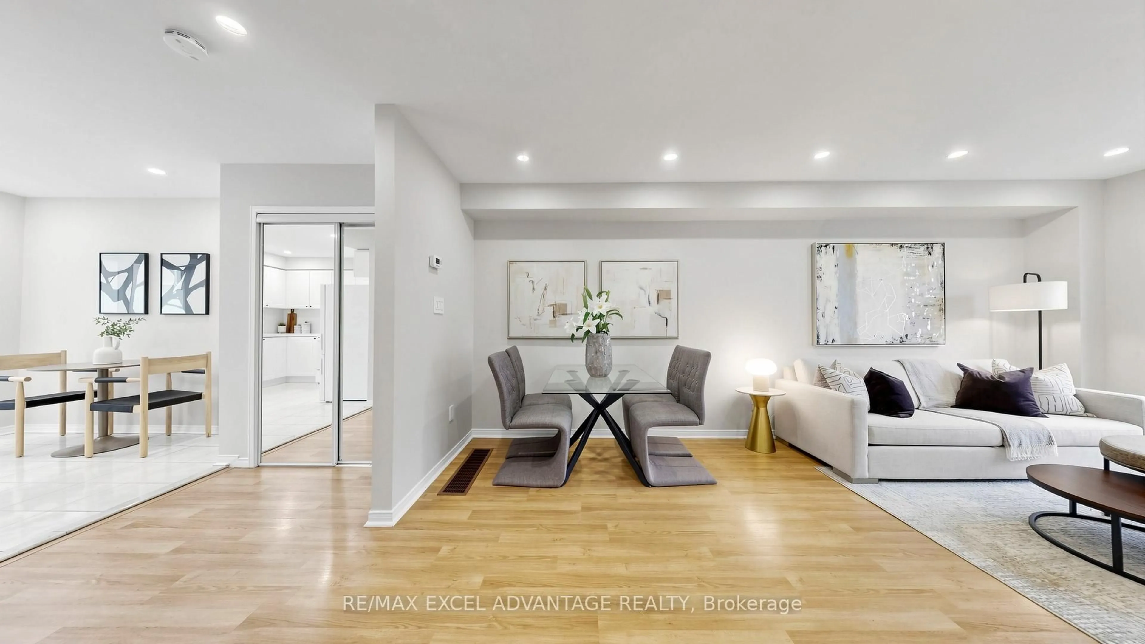 Living room with furniture, wood/laminate floor for 12 Azalea Gateway, Markham Ontario L3T 7T8