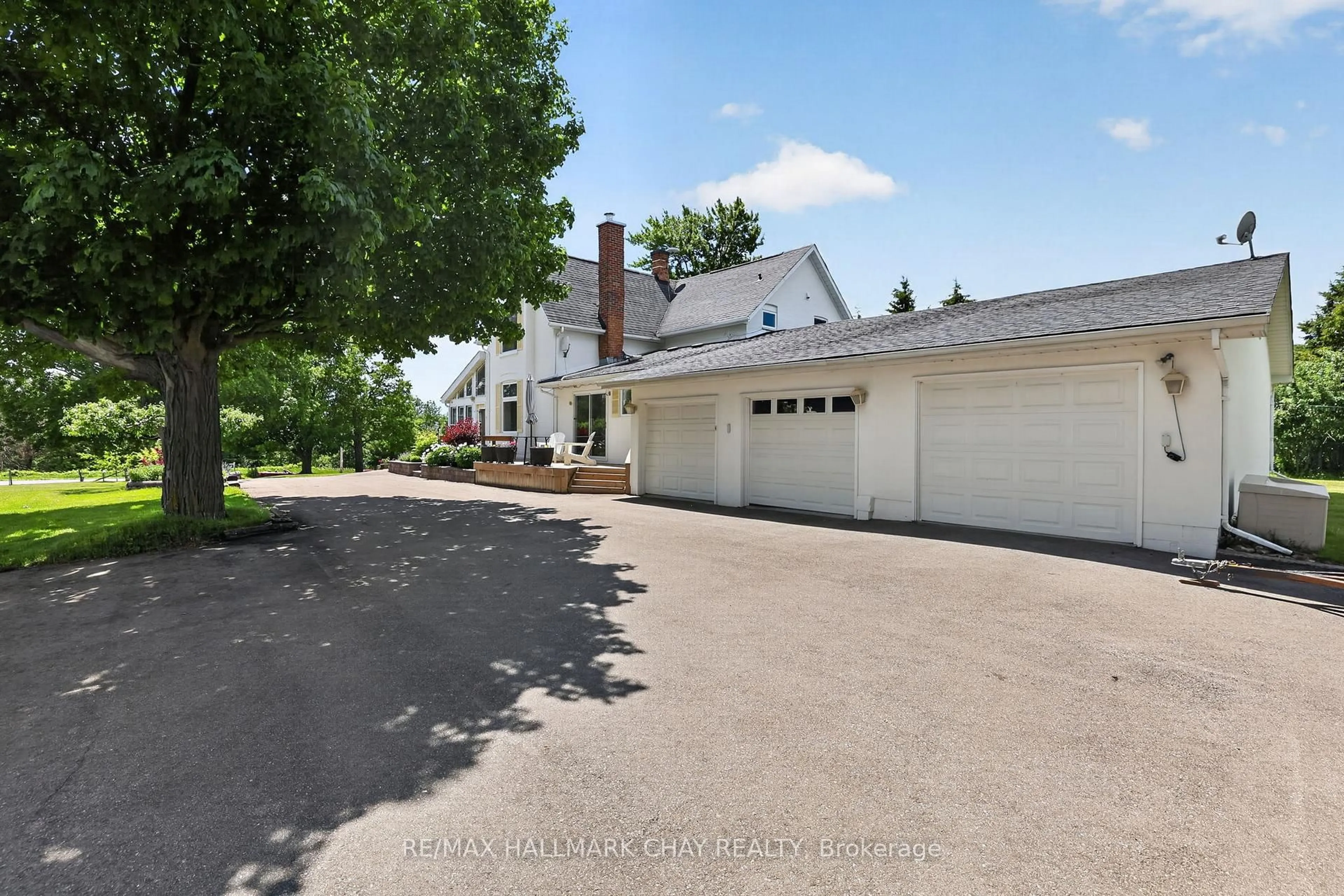 A pic from outside/outdoor area/front of a property/back of a property/a pic from drone, street for 7688 Sideroad 5, Adjala-Tosorontio Ontario L9R 1V3