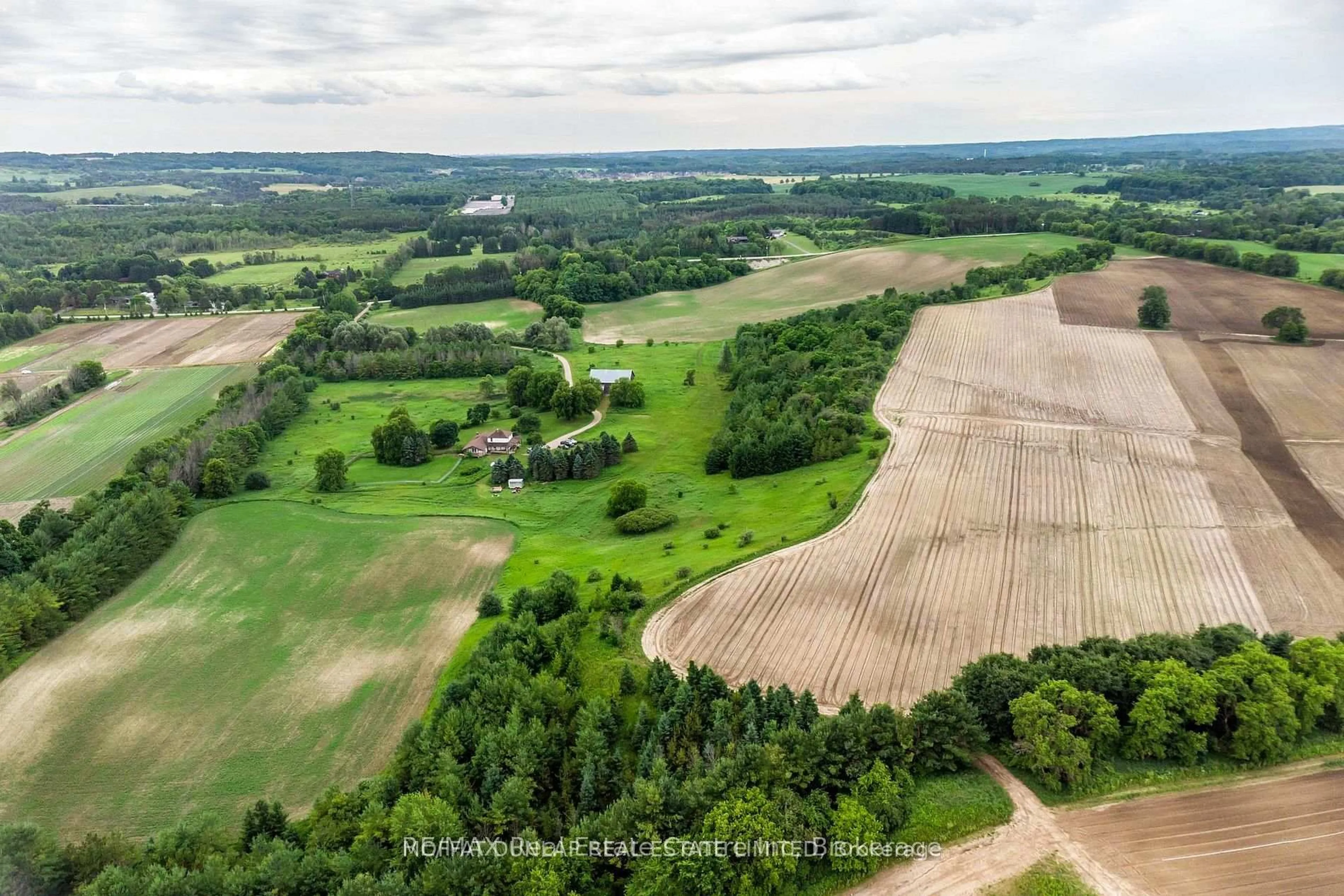 A pic from outside/outdoor area/front of a property/back of a property/a pic from drone, forest/trees view for 6952 Second Line, New Tecumseth Ontario L0G 1W0