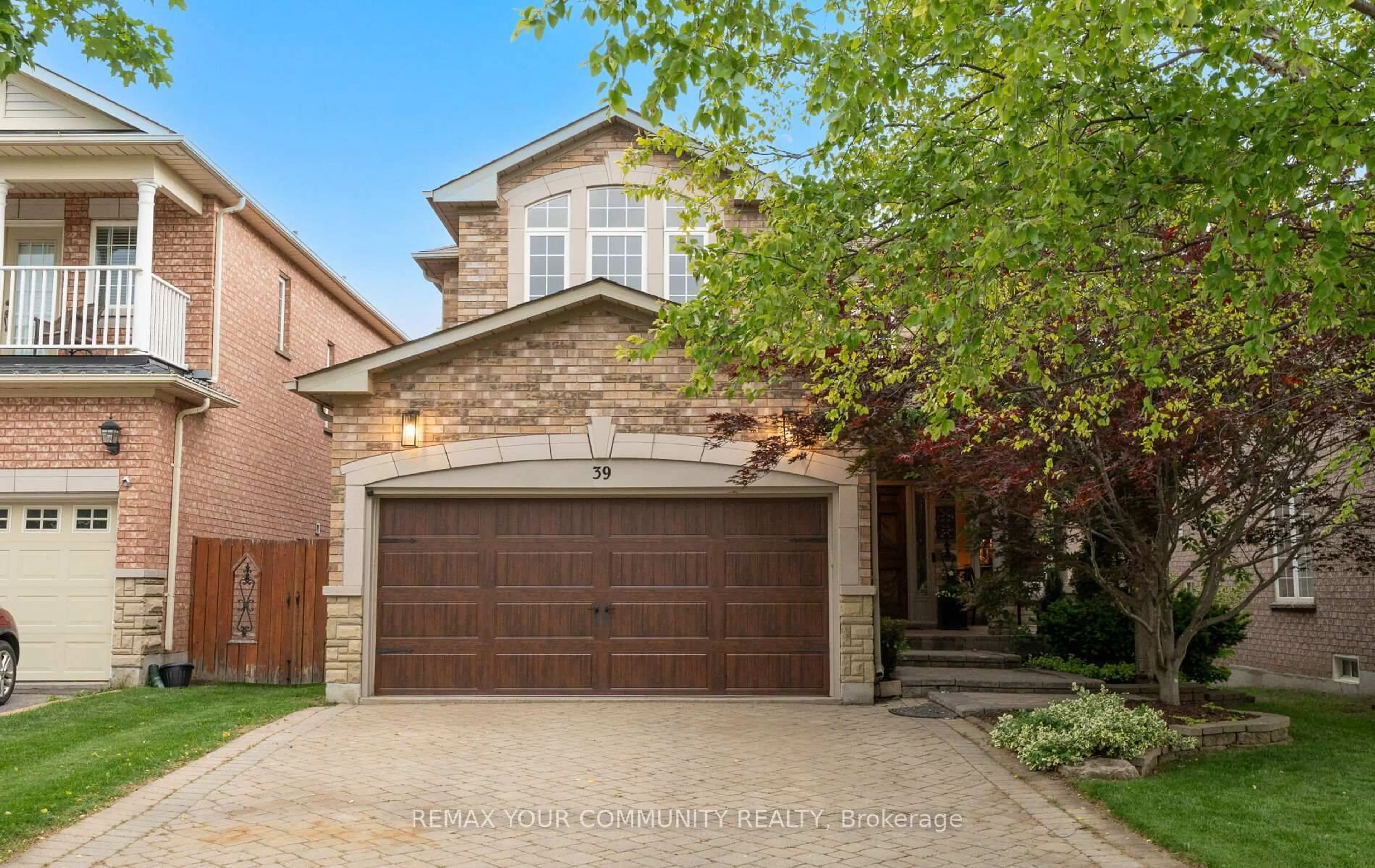 Home with brick exterior material, street for 39 Raintree Cres, Richmond Hill Ontario L4E 3T6