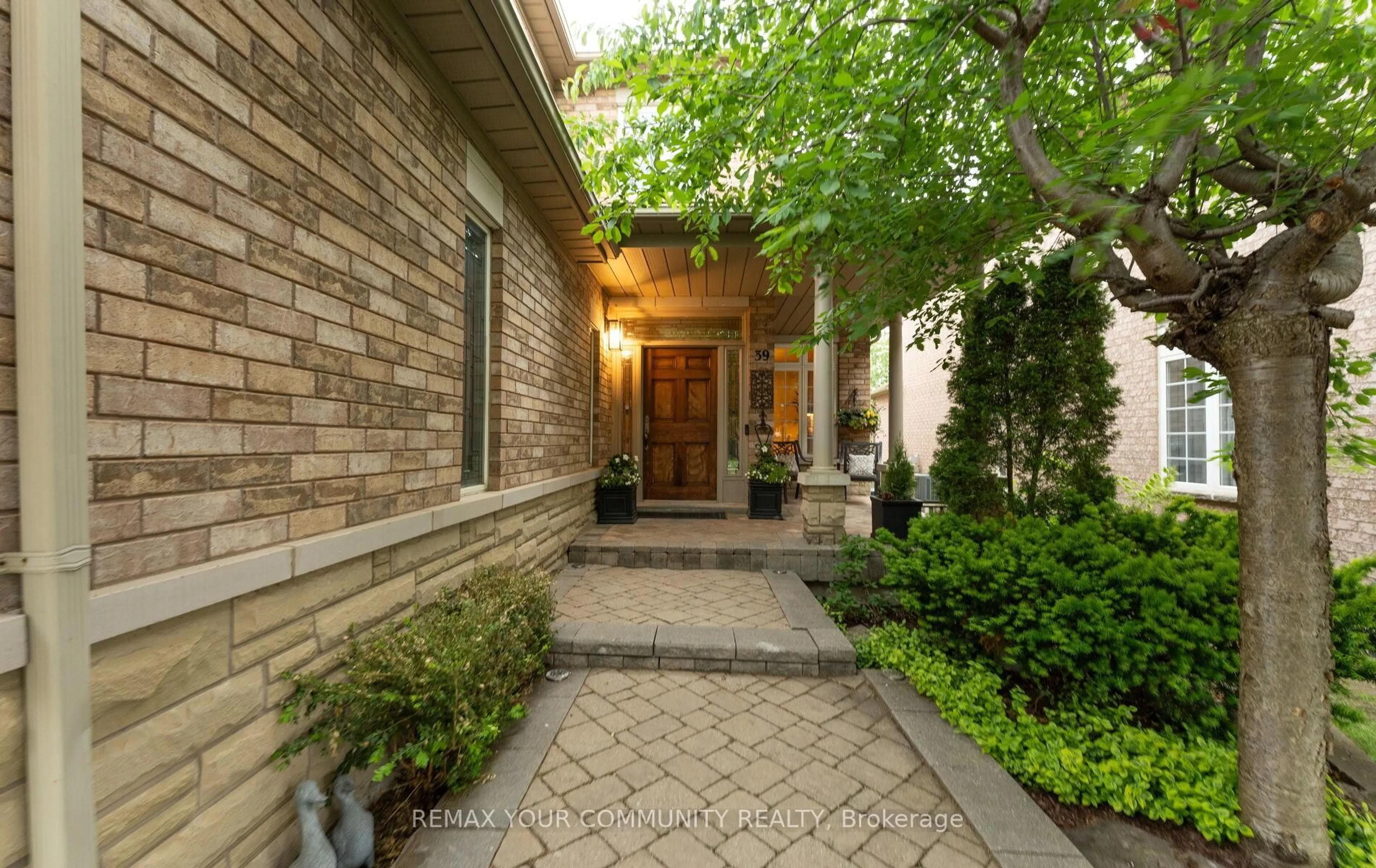 Home with brick exterior material, street for 39 Raintree Cres, Richmond Hill Ontario L4E 3T6