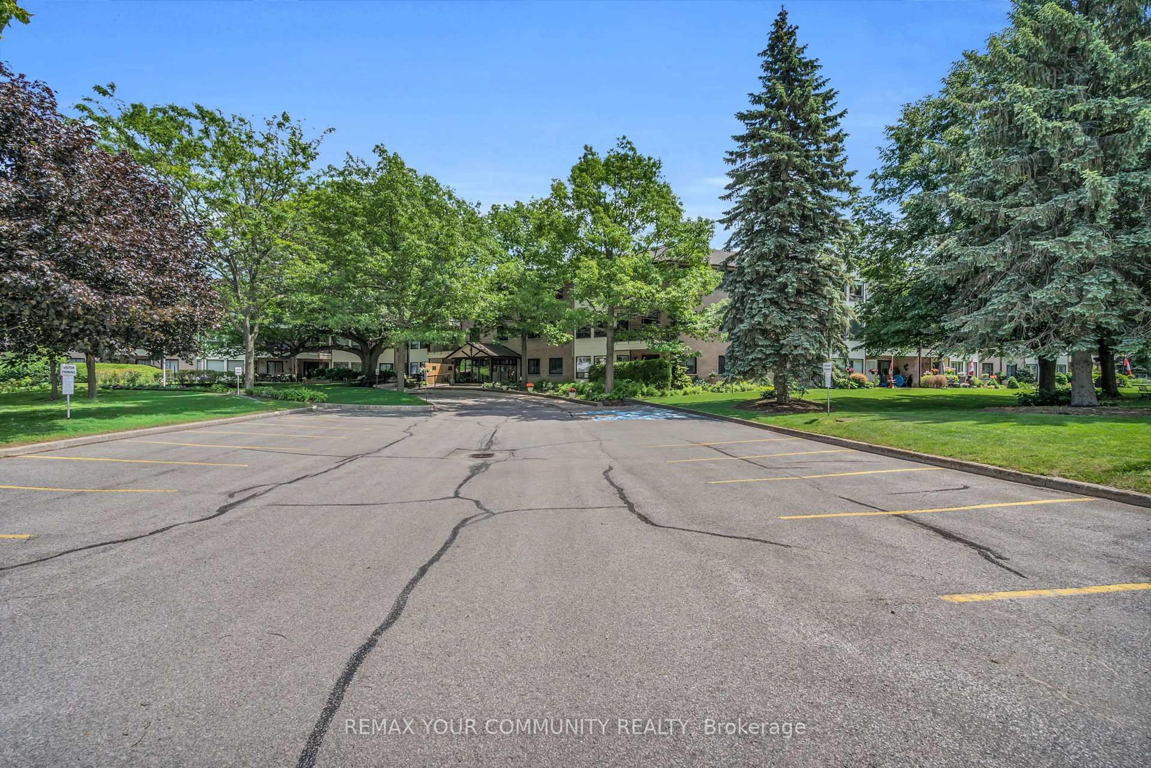 A pic from outside/outdoor area/front of a property/back of a property/a pic from drone, street for 111 Grew Blvd #210, Georgina Ontario L0E 1L0