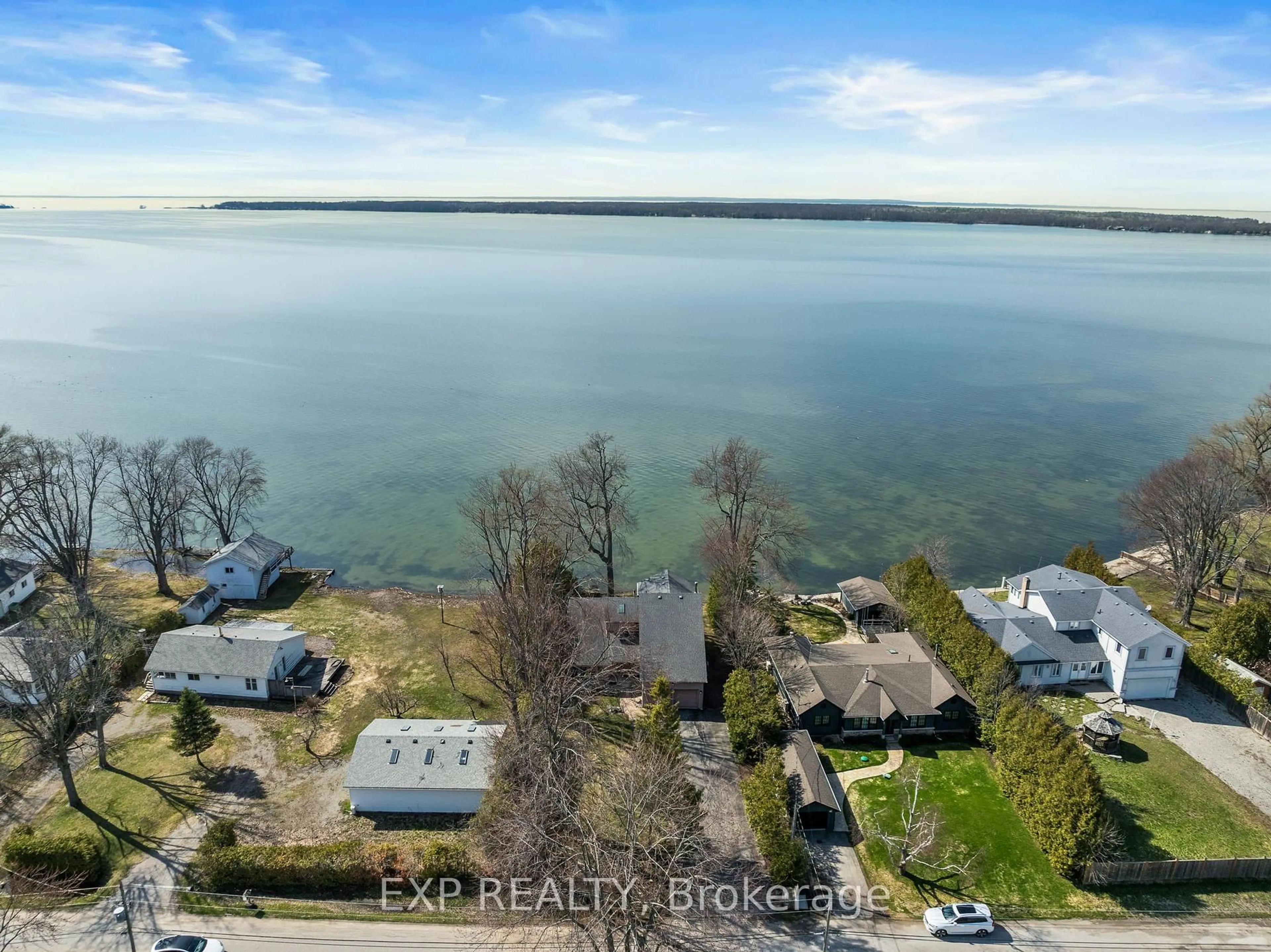 A pic from outside/outdoor area/front of a property/back of a property/a pic from drone, water/lake/river/ocean view for 582 Duclos Point Rd, Georgina Ontario L0E 1N0