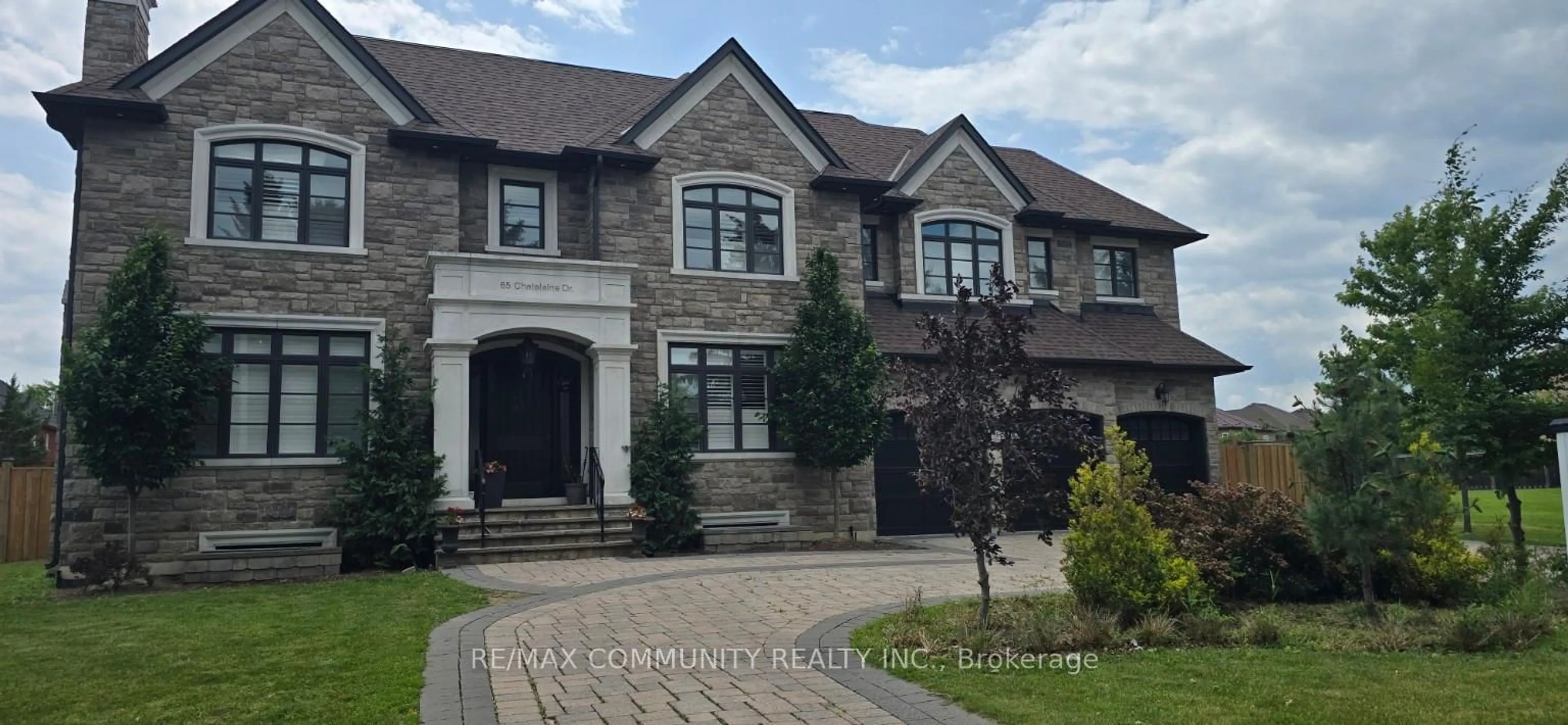 Home with brick exterior material, street for 65 Chatelaine Dr, Markham Ontario L3S 3W7