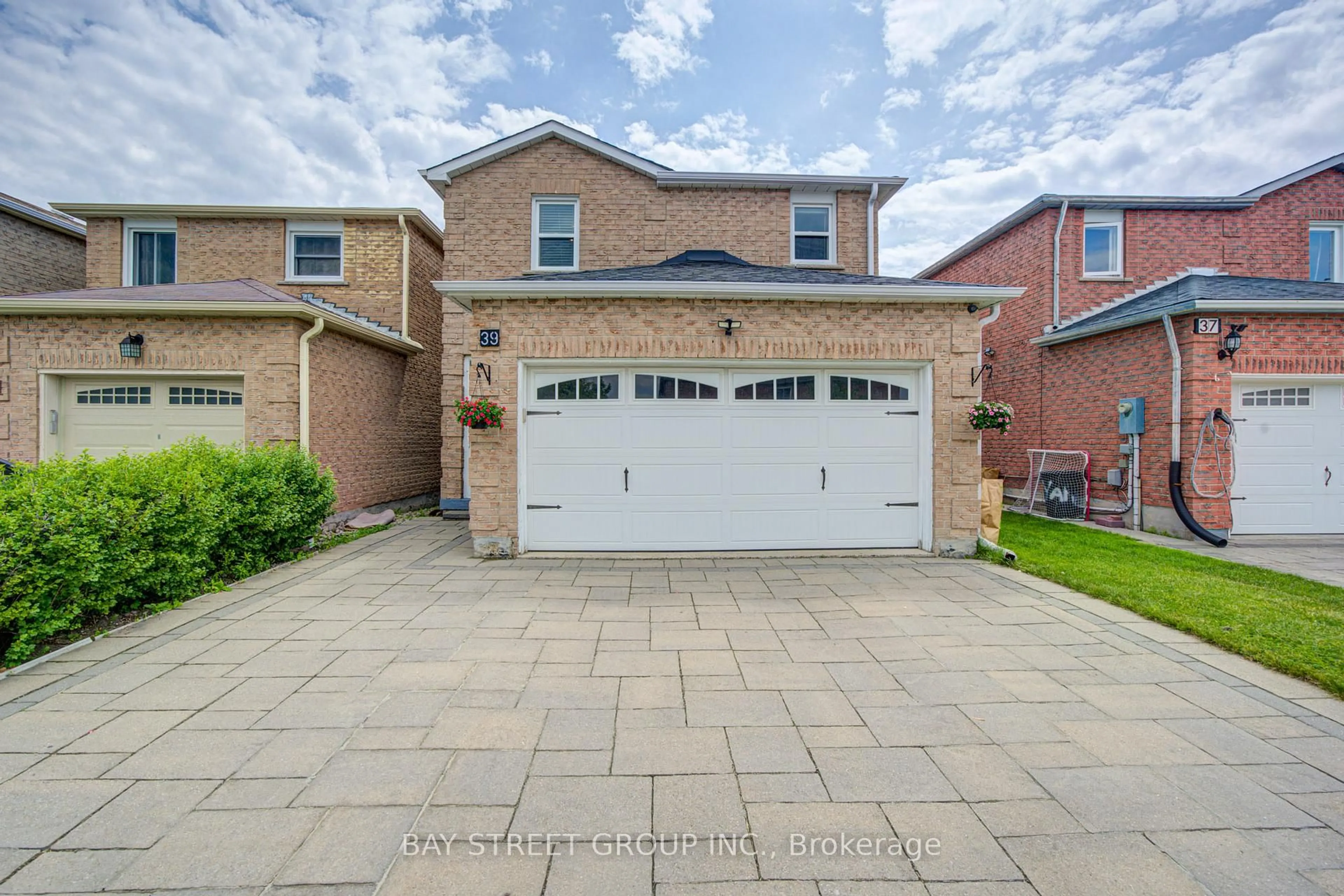 Home with brick exterior material, street for 39 Ketchum Cres, Markham Ontario L3S 3G2