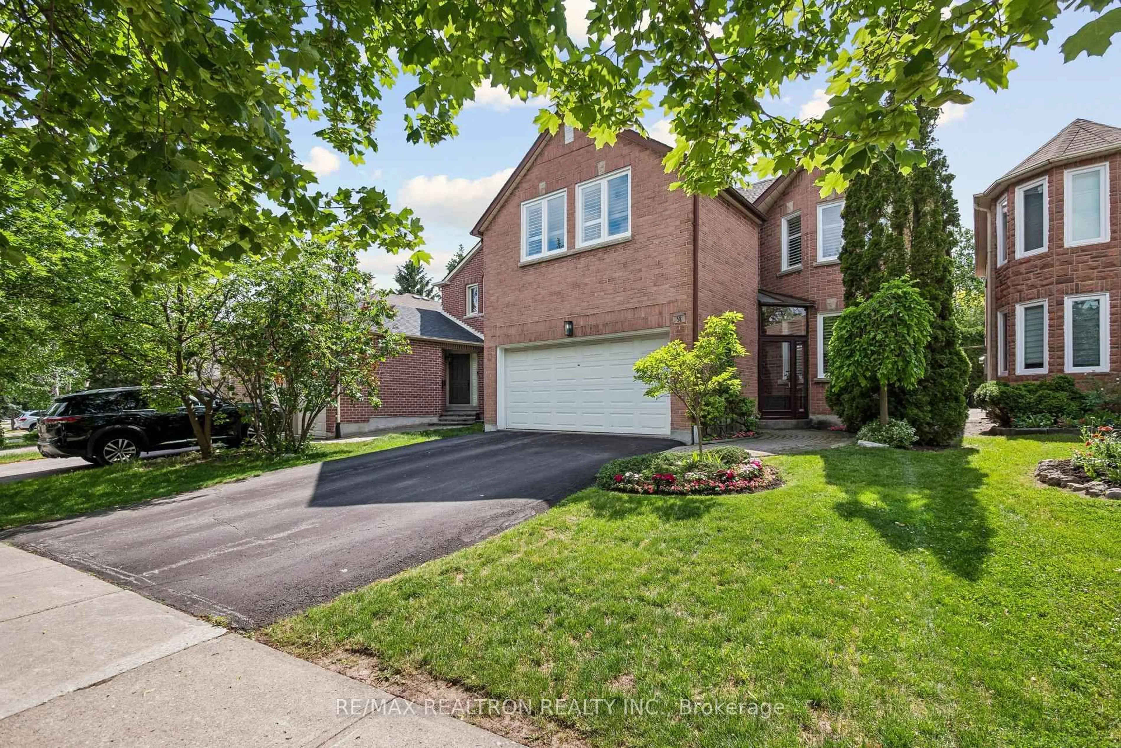 Home with brick exterior material, street for 58 Roseborough Cres, Vaughan Ontario L4J 4V1