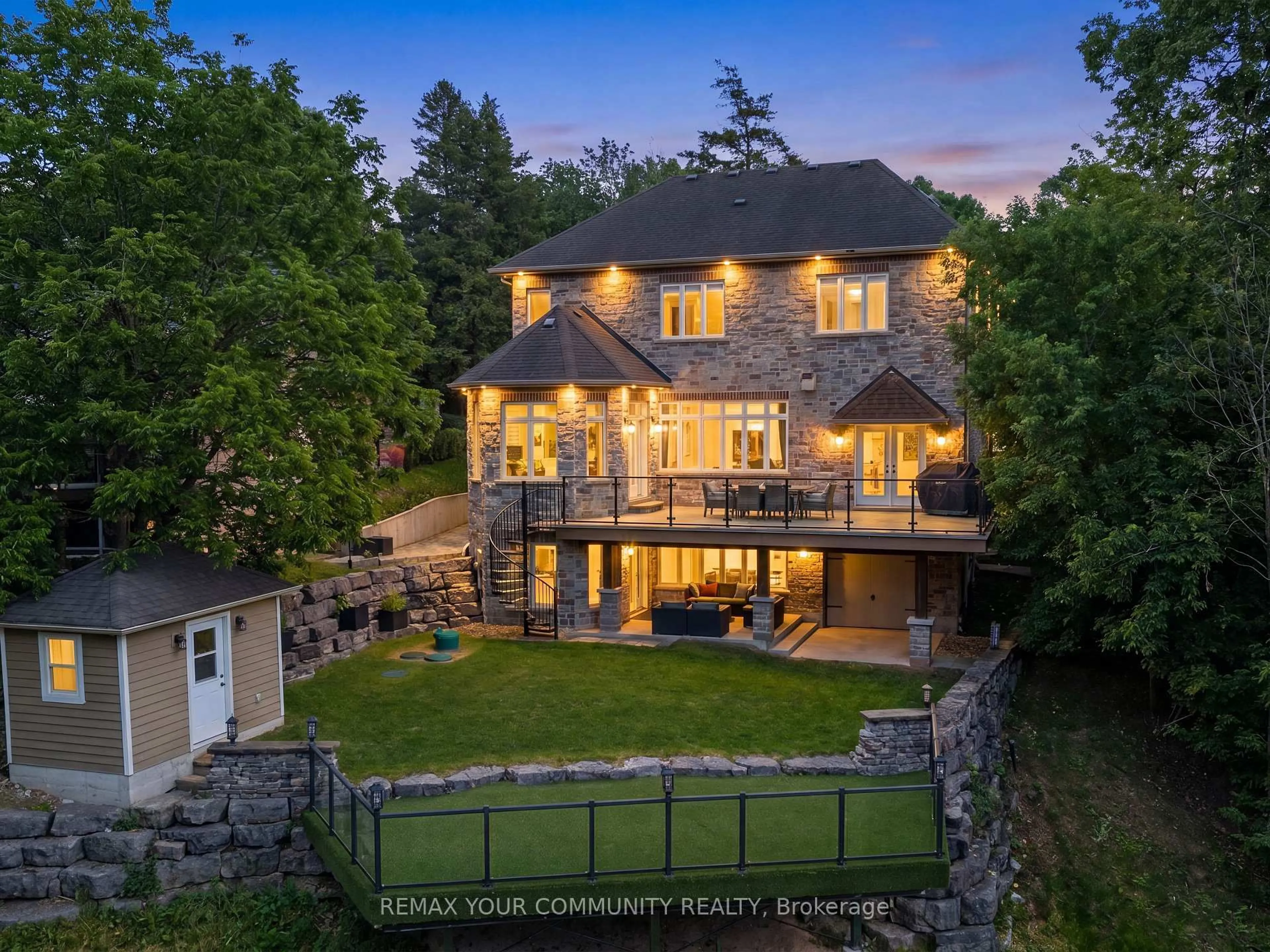 A pic from outside/outdoor area/front of a property/back of a property/a pic from drone, water/lake/river/ocean view for 124 Elmpine Tr, King Ontario L7B 1K4