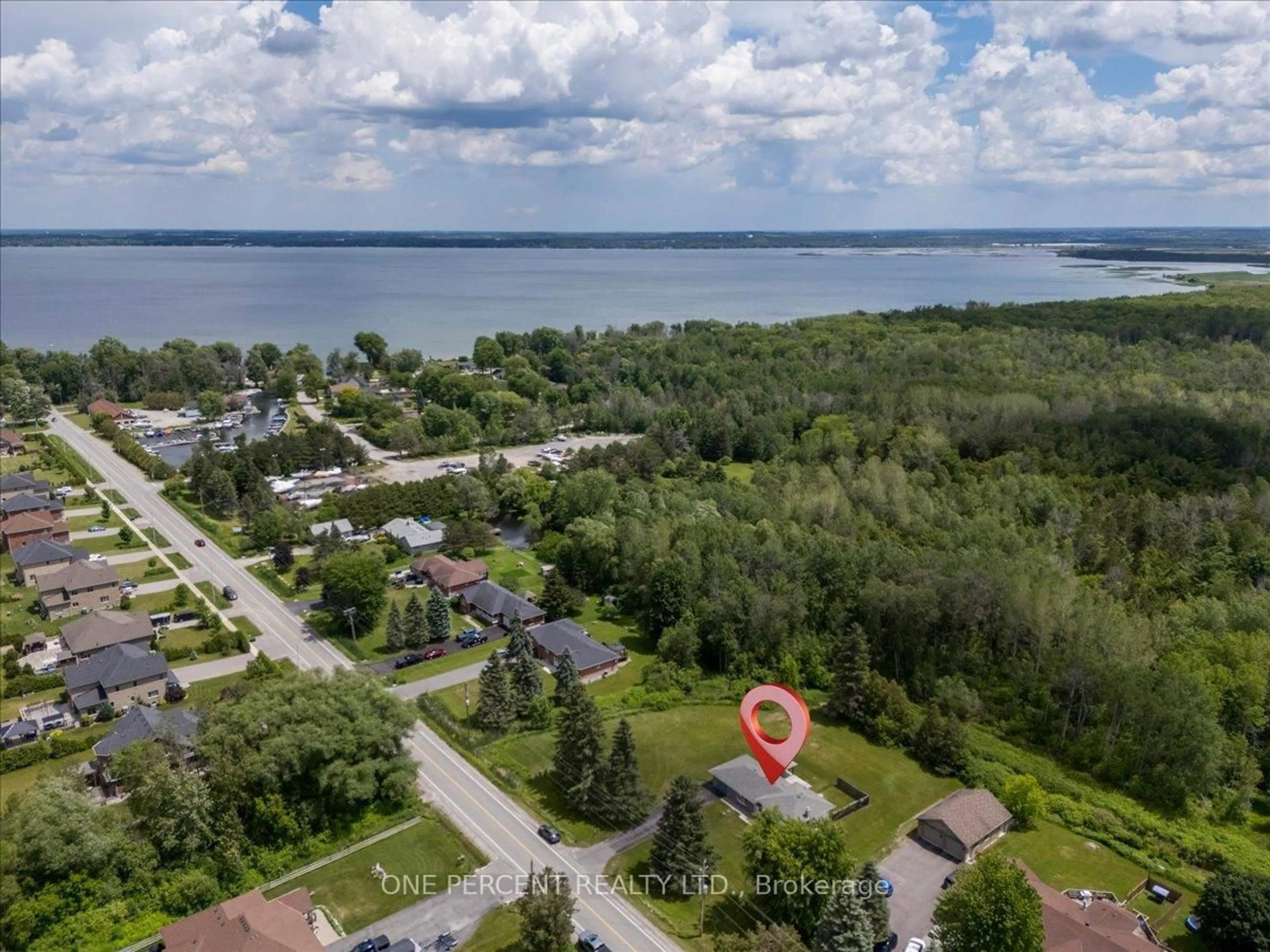 A pic from outside/outdoor area/front of a property/back of a property/a pic from drone, water/lake/river/ocean view for 1235 Gilford Rd, Innisfil Ontario L0L 1R0