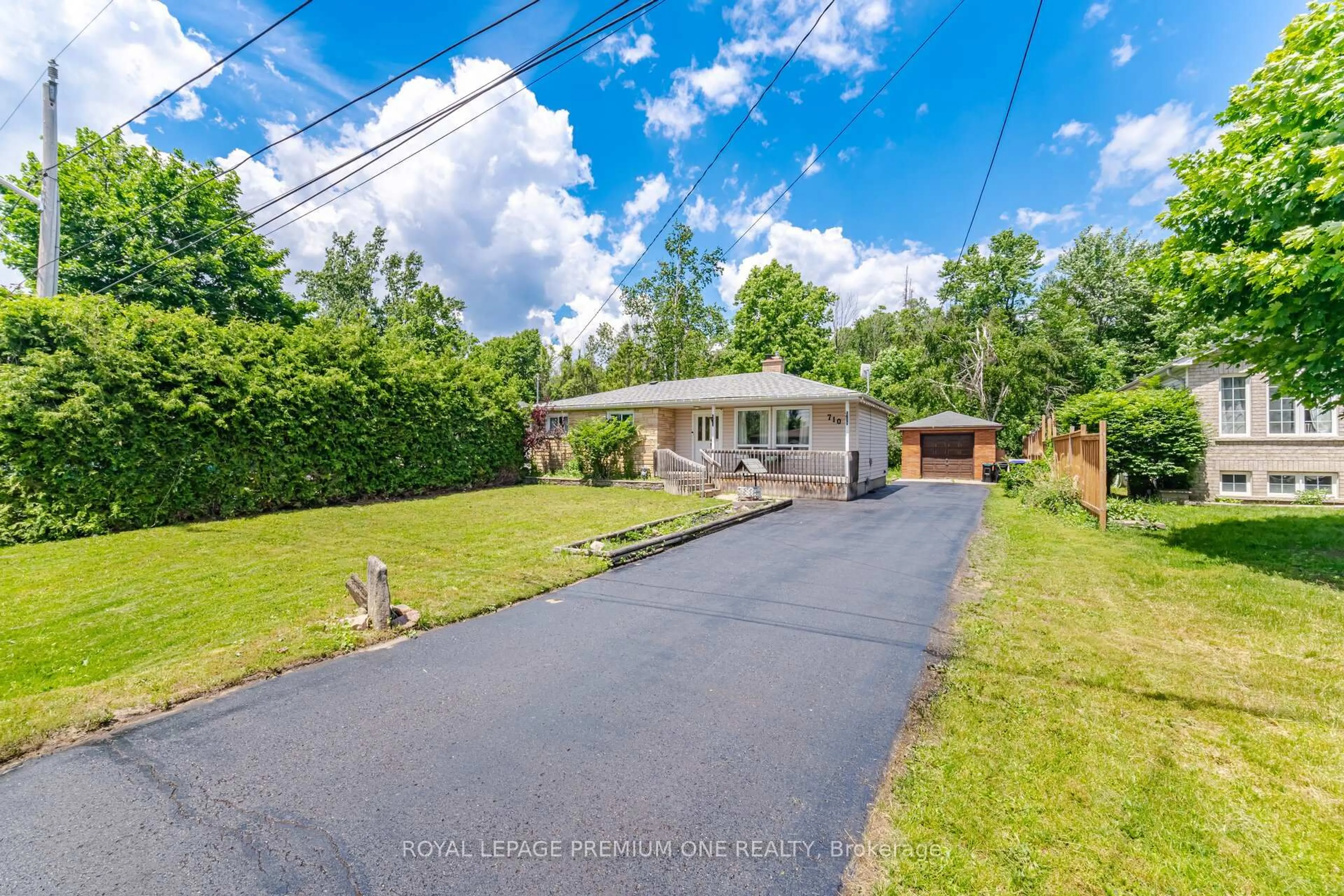A pic from outside/outdoor area/front of a property/back of a property/a pic from drone, water/lake/river/ocean view for 710 Rose Lane, Innisfil Ontario L9S 2H4