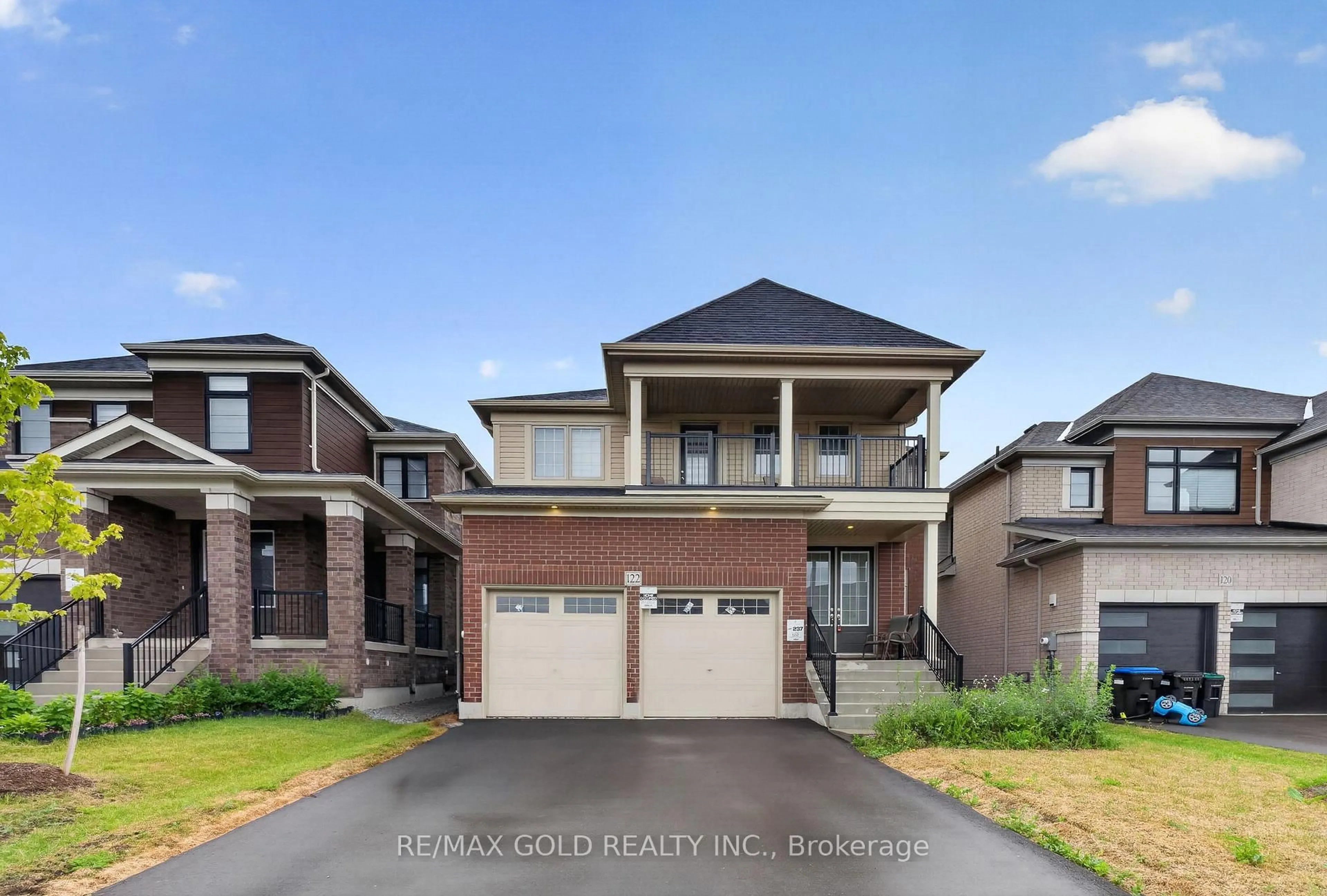 Home with brick exterior material, street for 122 Bluebird Blvd, Adjala-Tosorontio Ontario L0G 1W0