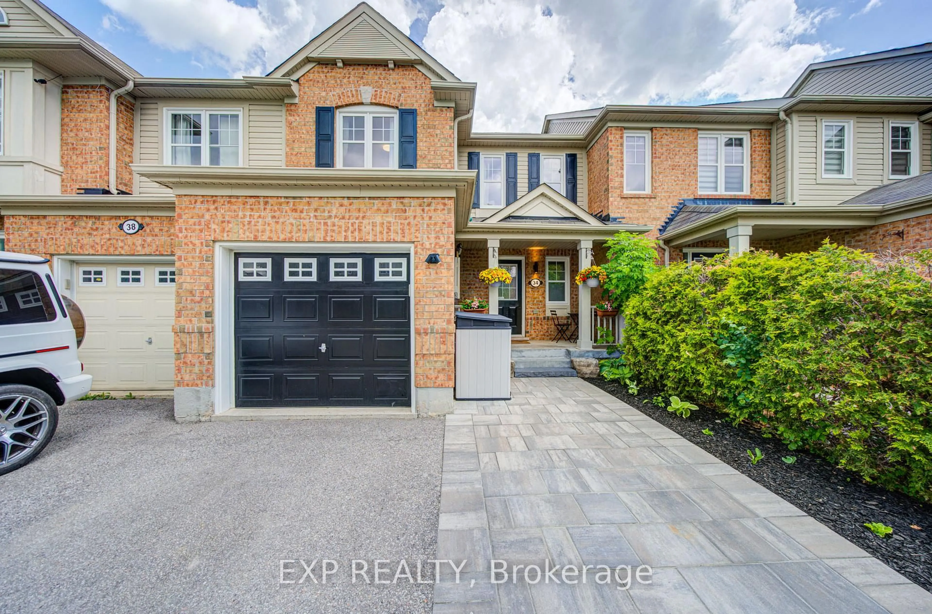Home with brick exterior material, street for 34 Kartok Ave, Whitchurch-Stouffville Ontario L4A 0R2