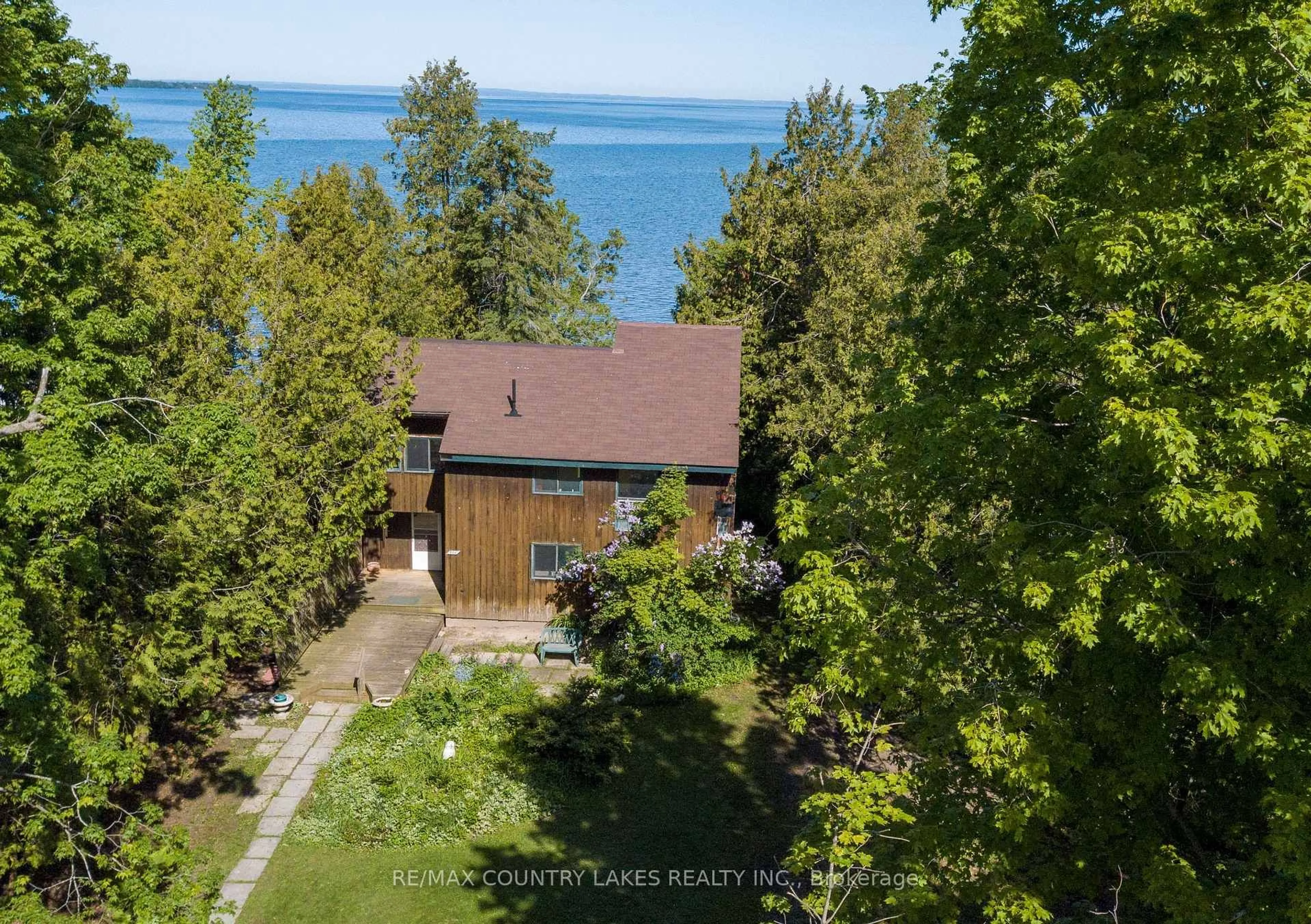 A pic from outside/outdoor area/front of a property/back of a property/a pic from drone, water/lake/river/ocean view for 416 Morrison Ave, Brock Ontario L0K 1A0