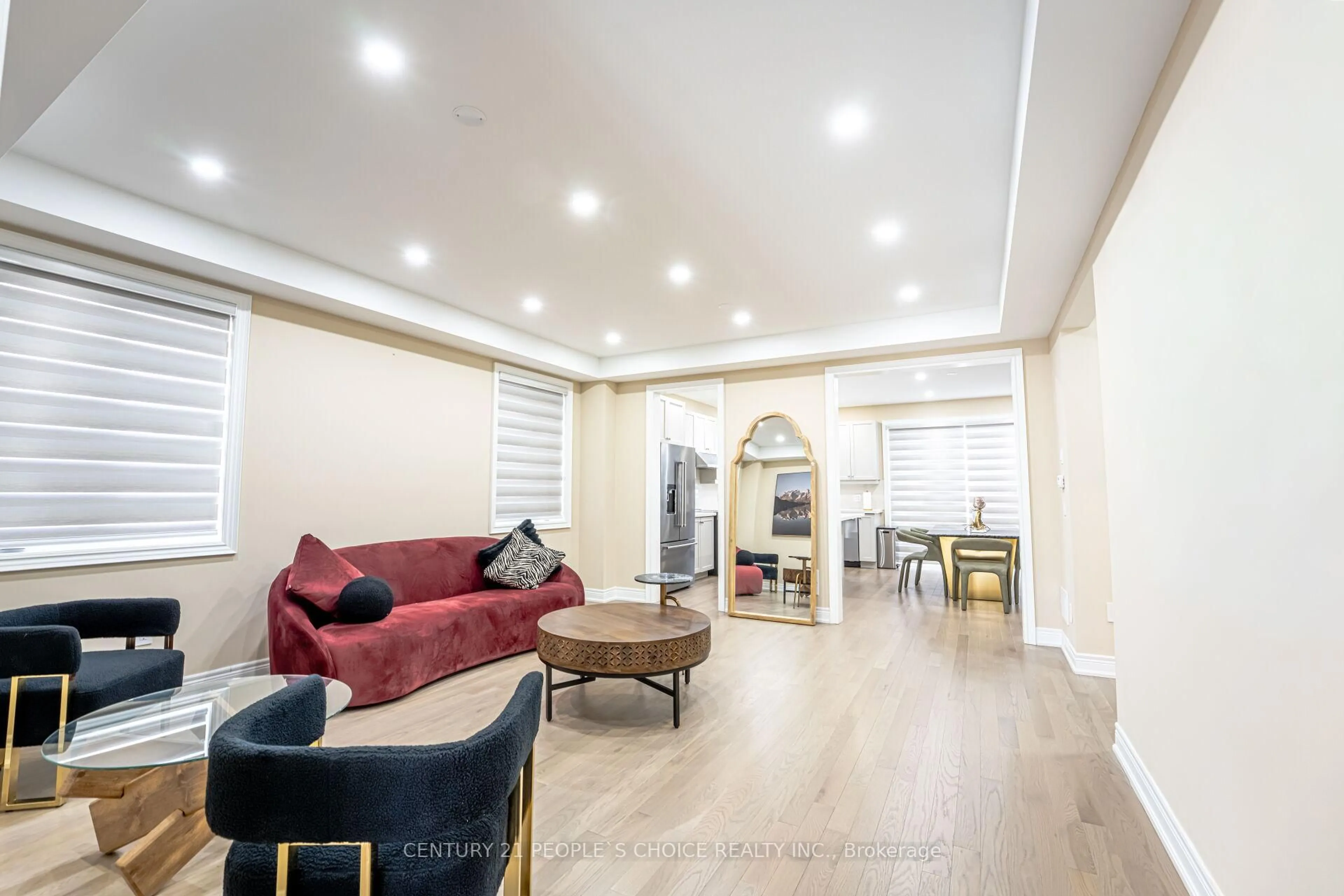 Living room with furniture, wood/laminate floor for 56 Plank Rd, Bradford West Gwillimbury Ontario L3Z 4N3