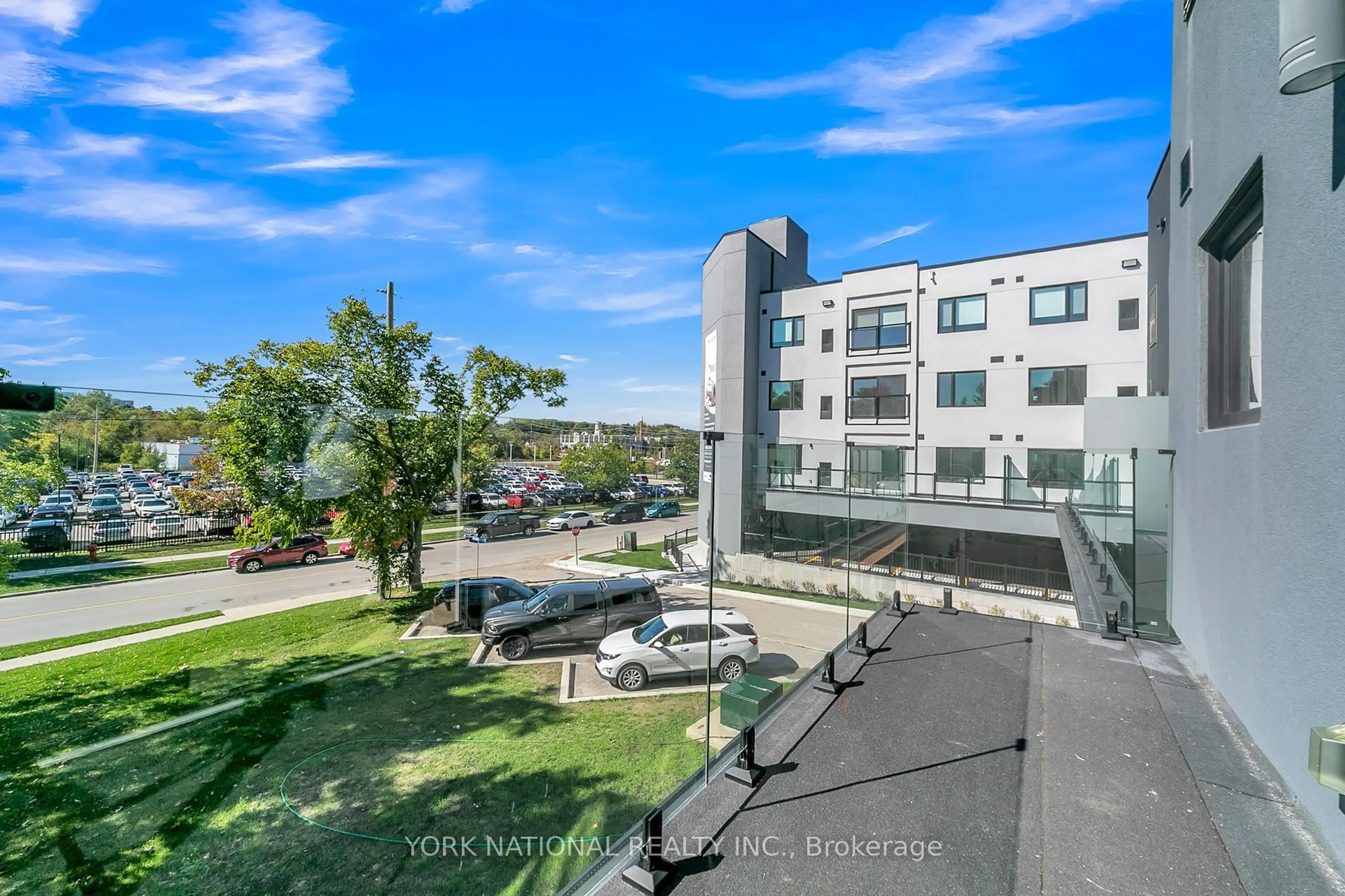 A pic from outside/outdoor area/front of a property/back of a property/a pic from drone, city buildings view from balcony for 59 Charles St #1, Newmarket Ontario L3Y 3V7