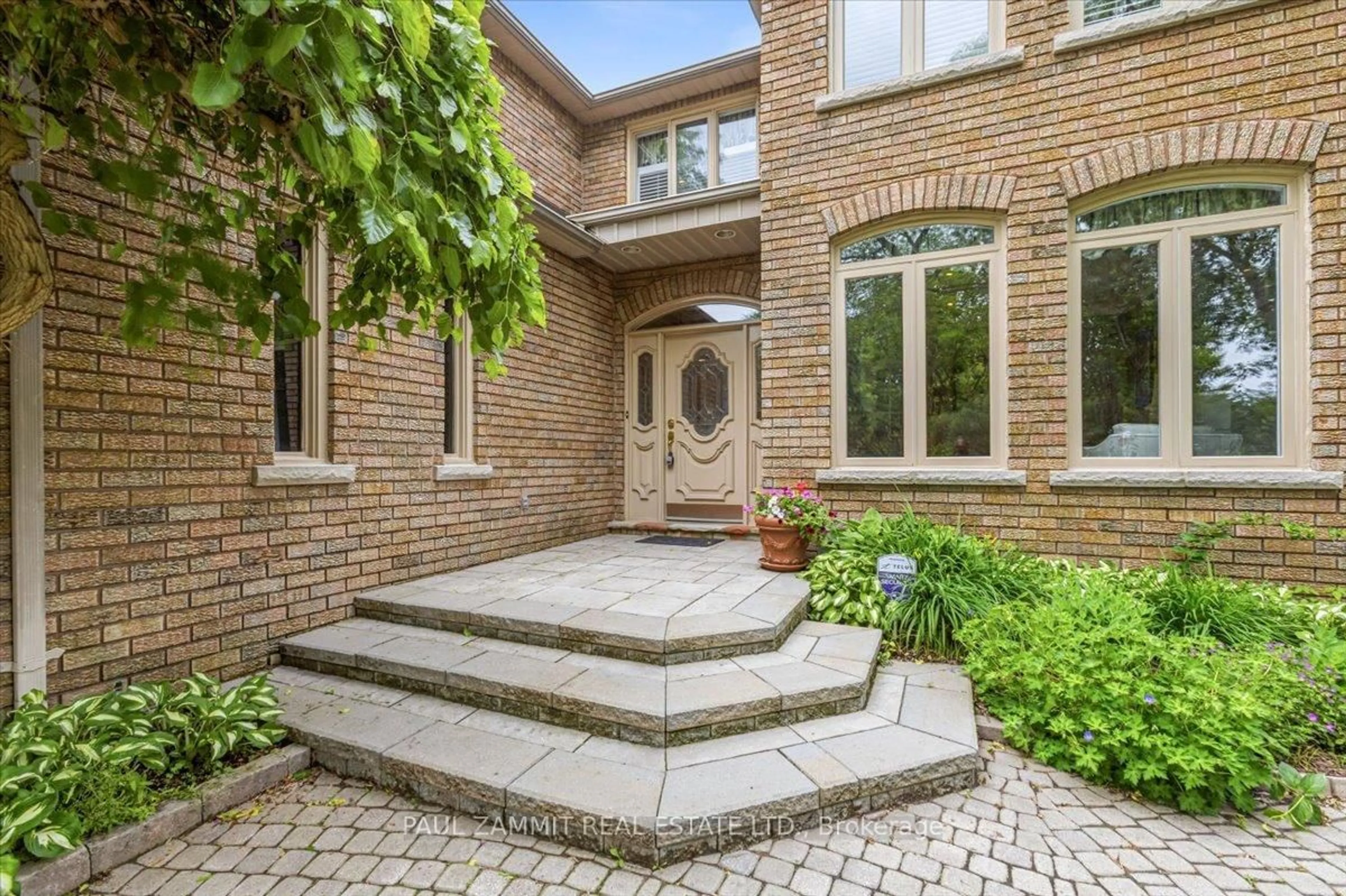 Home with brick exterior material, street for 20 Tanglewood Tr, Markham Ontario L3T 6T9