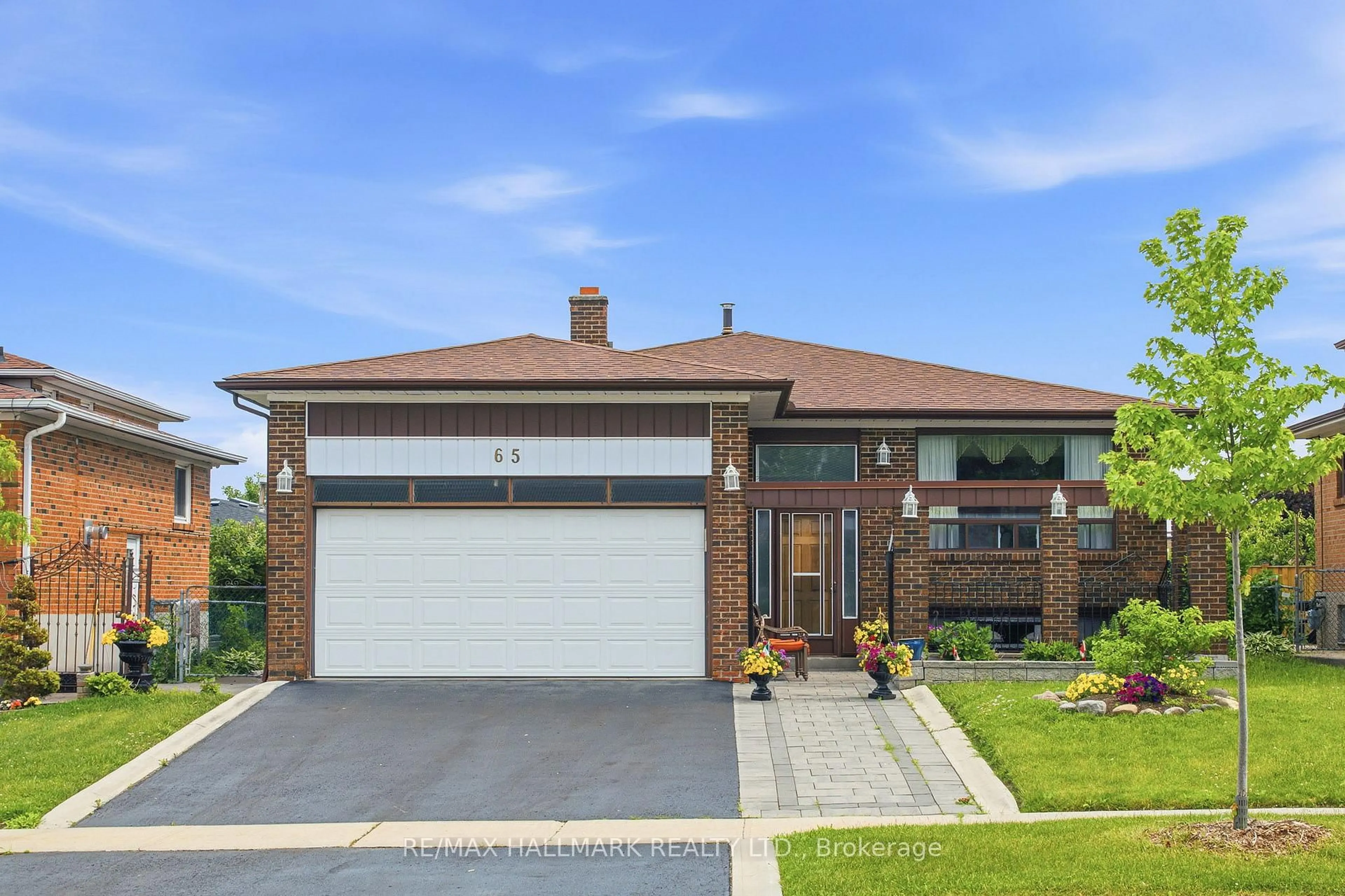 Home with brick exterior material, street for 65 Oakhill Rd, Vaughan Ontario L4L 2H2