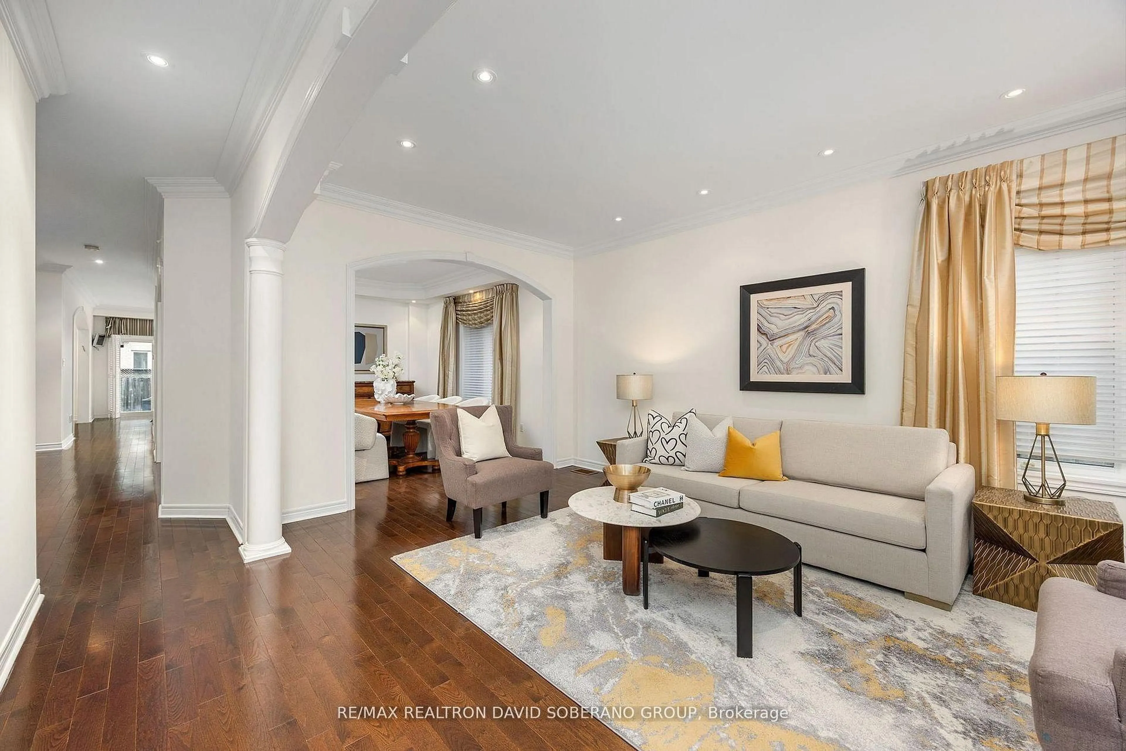 Living room with furniture, wood/laminate floor for 26 Chopin Blvd, Vaughan Ontario L4J 8Y6