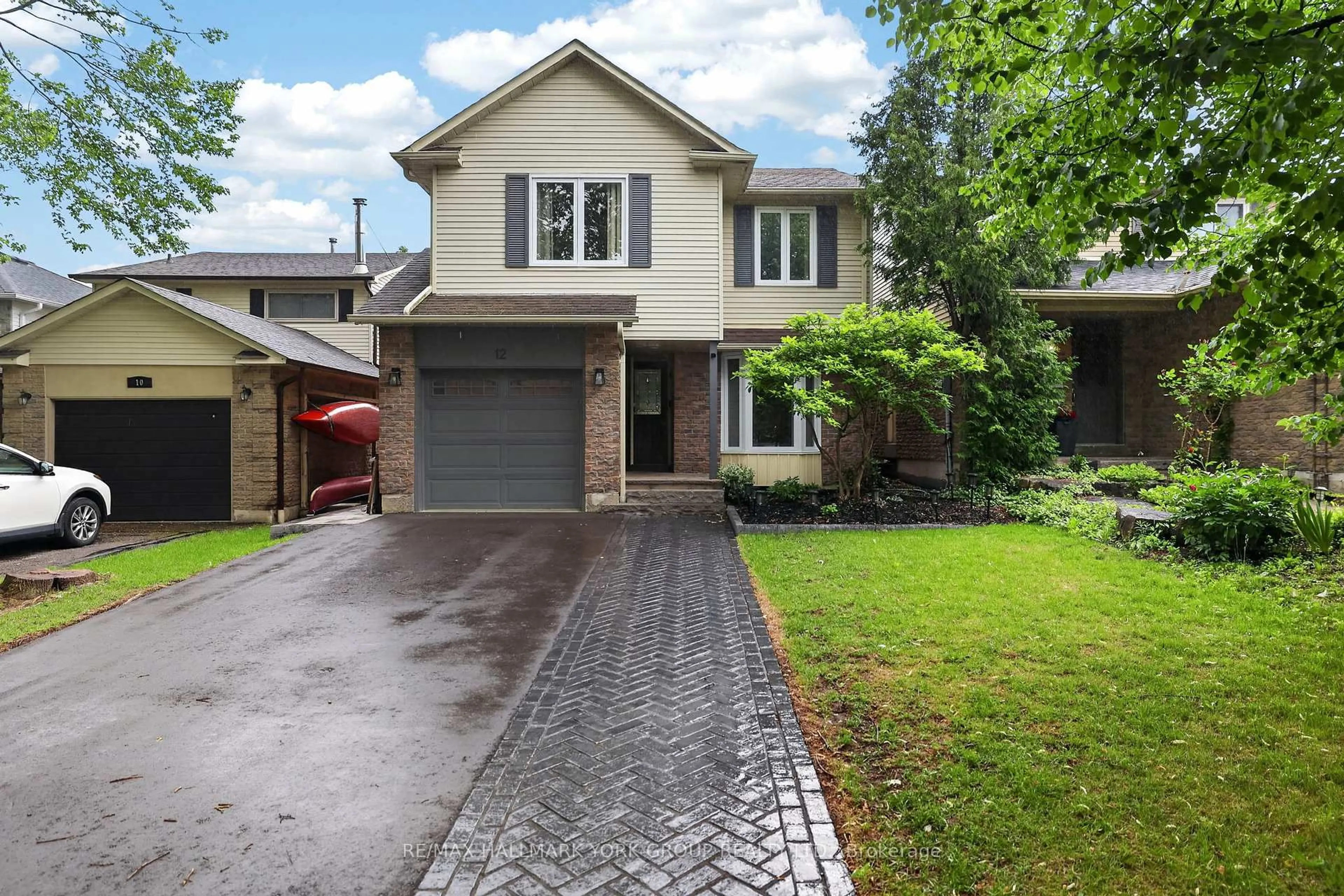 Home with brick exterior material, street for 12 Odin Cres, Aurora Ontario L4G 3T4