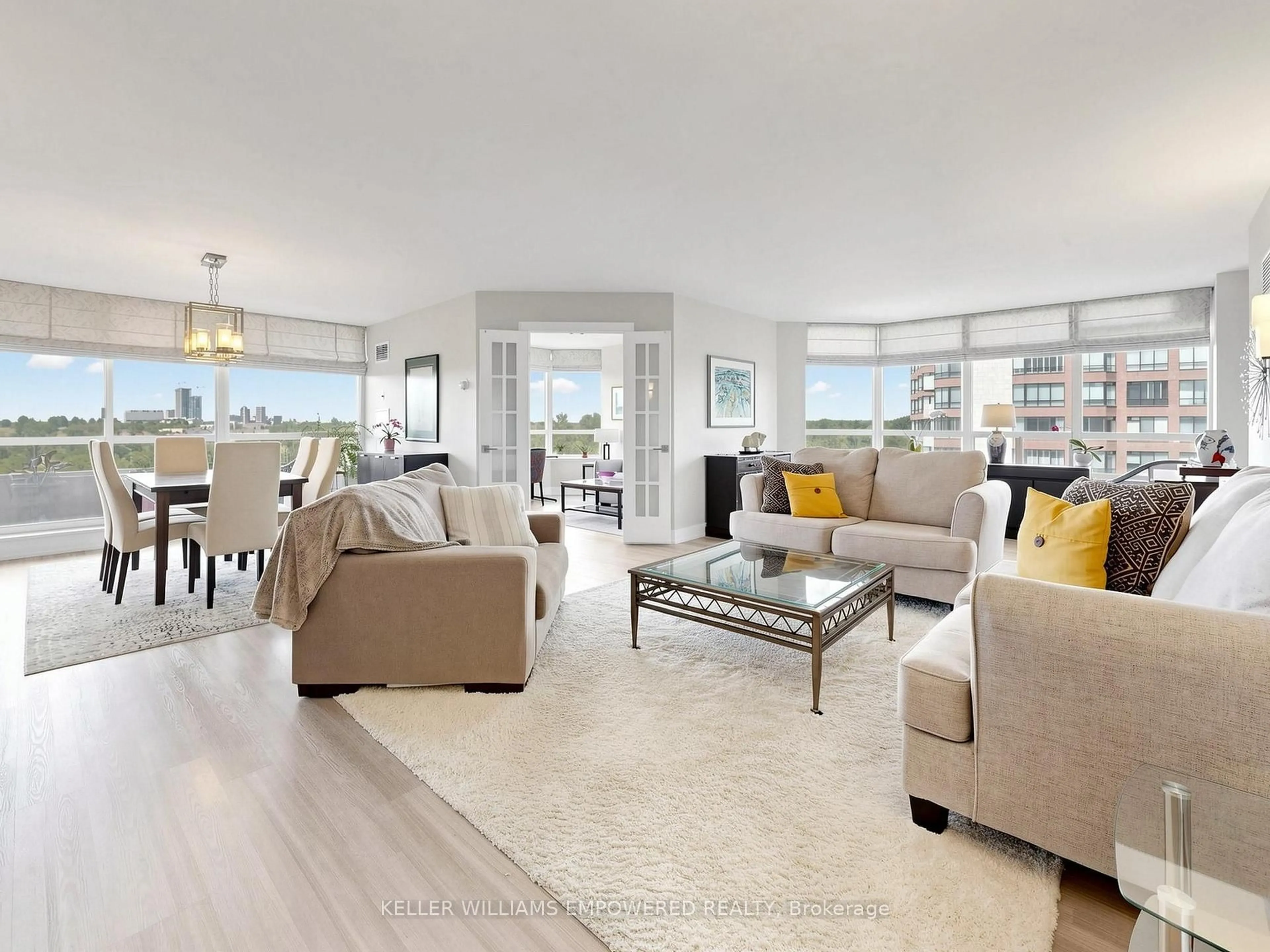 Living room with furniture, unknown for 610 Bullock Dr #614, Markham Ontario L3R 0G1