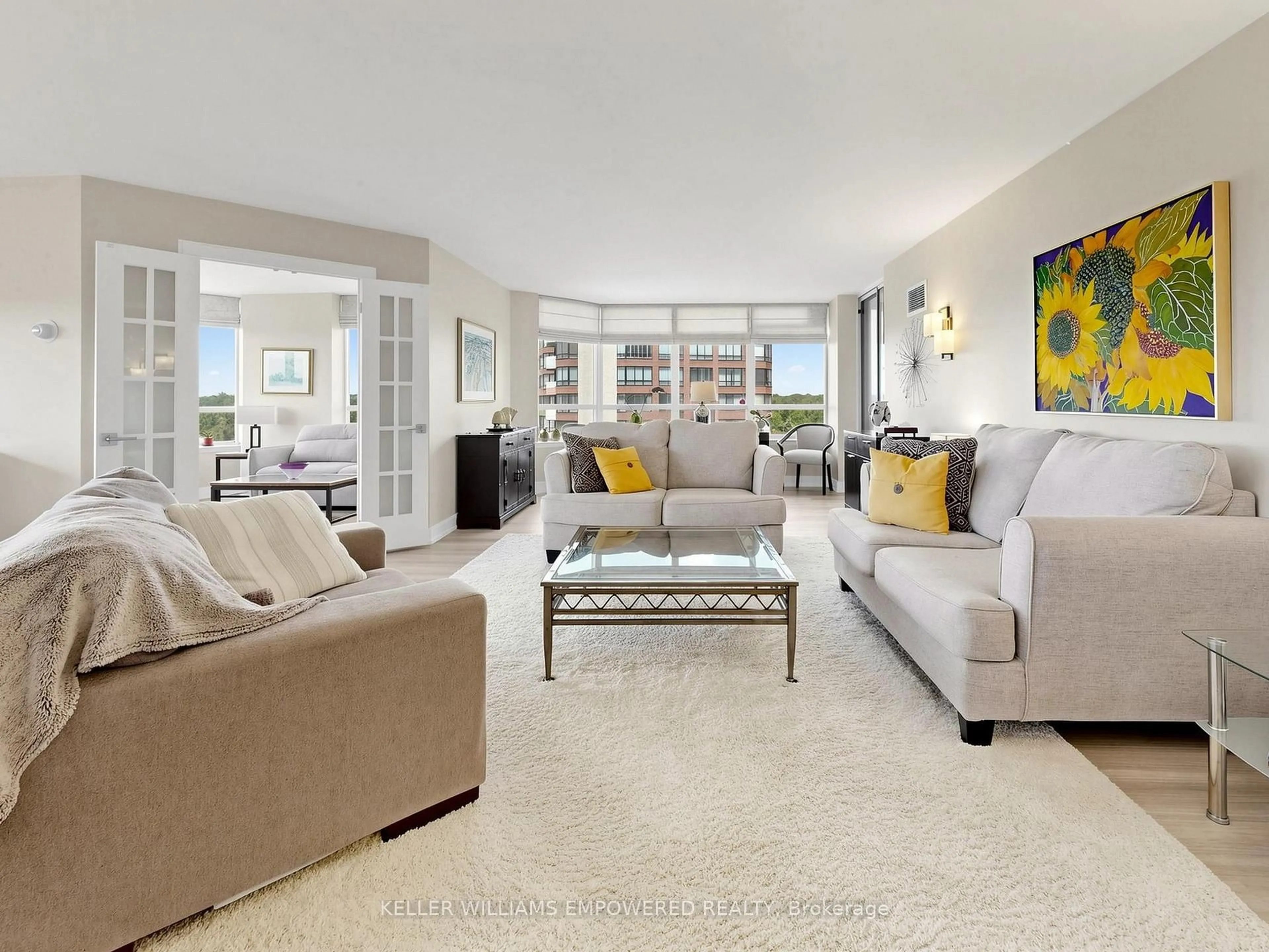 Living room with furniture, unknown for 610 Bullock Dr #614, Markham Ontario L3R 0G1