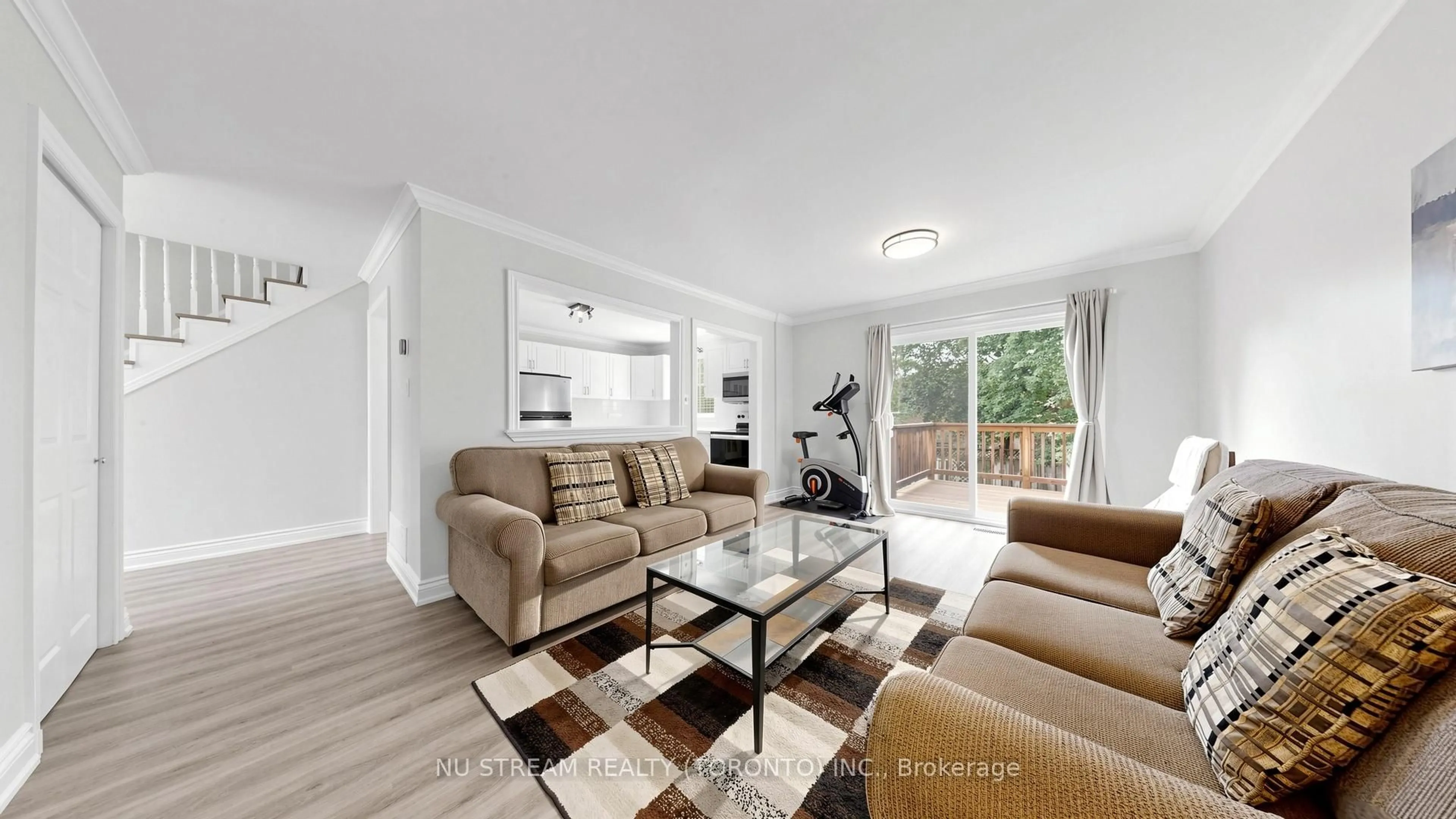 Living room with furniture, wood/laminate floor for 17 Newlands Ave, Georgina Ontario L4P 3T3