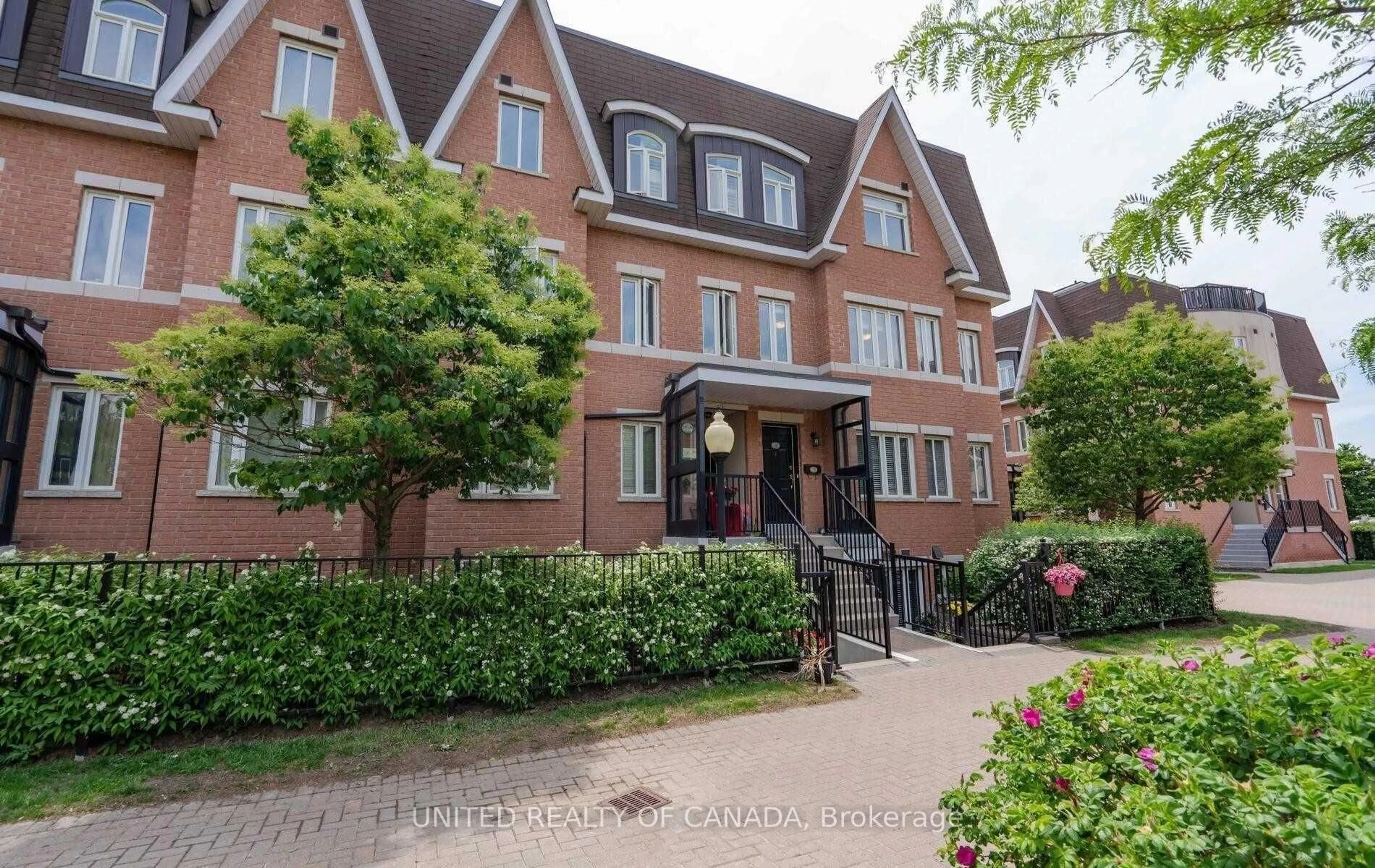 Home with brick exterior material, street for 312 John St #330, Markham Ontario L3T 0A7