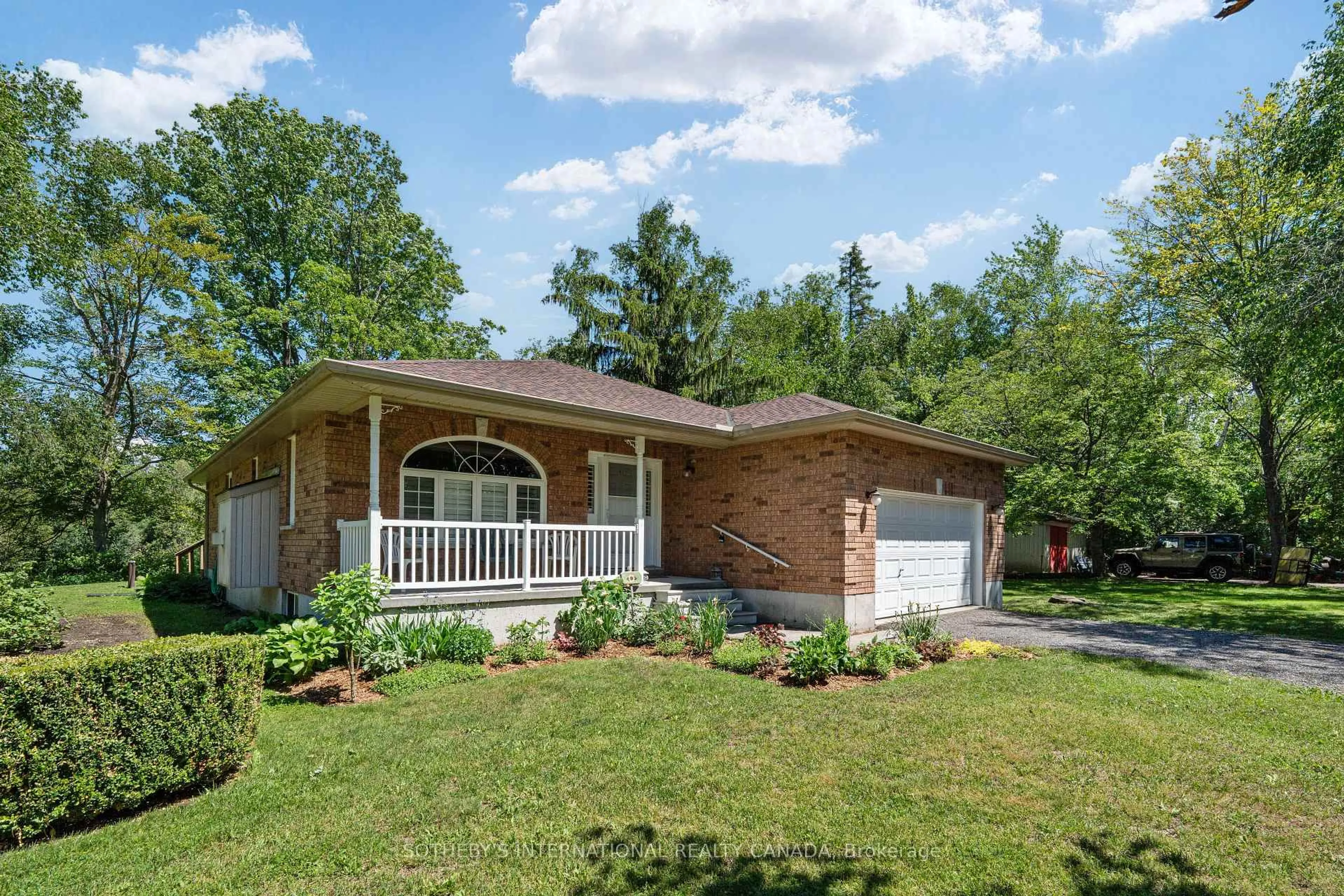 Home with brick exterior material, unknown for 63 Pinecrest Rd, Georgina Ontario L0E 1N0