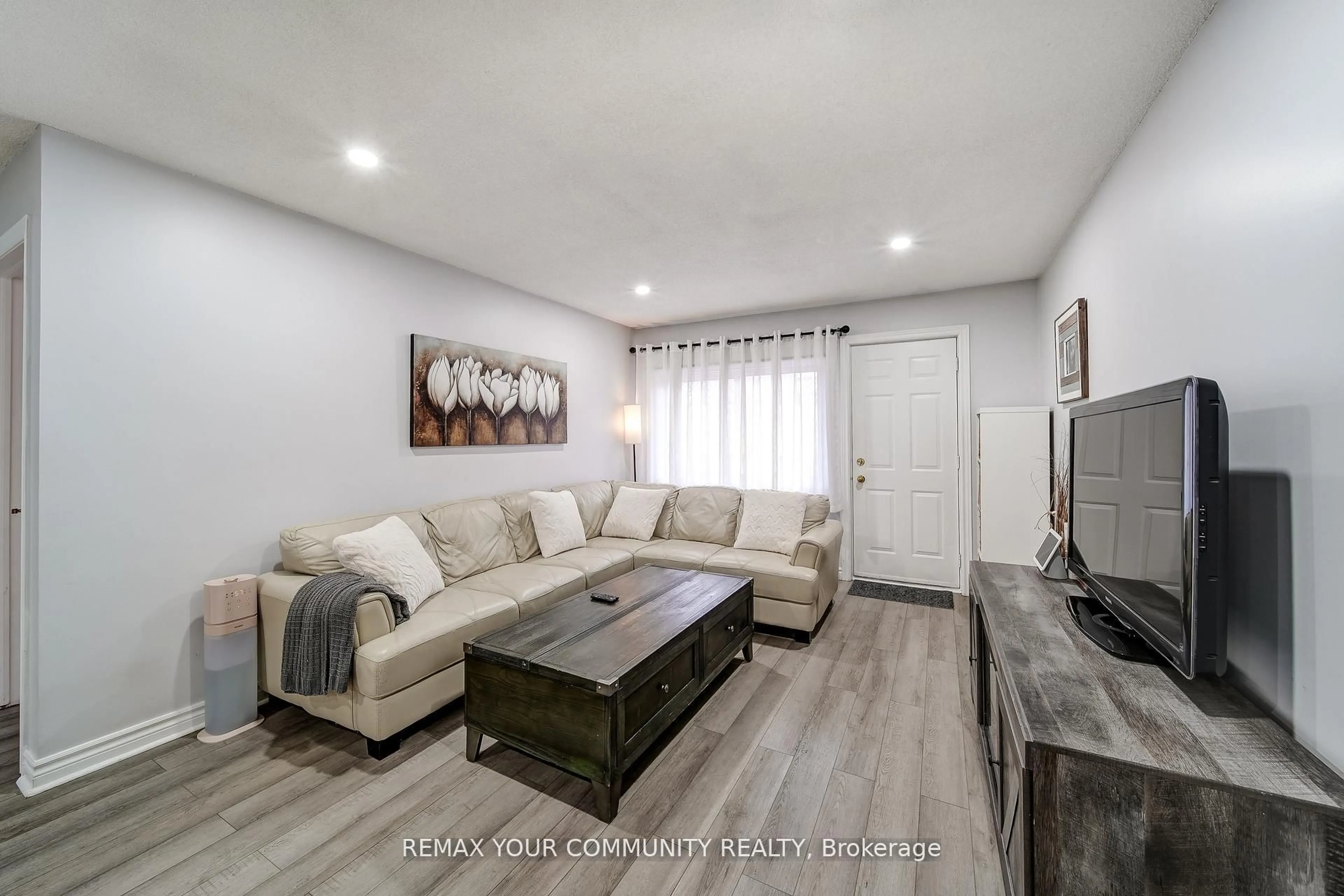 Living room with furniture, unknown for 77 Mill St #3, New Tecumseth Ontario L0G 1W0