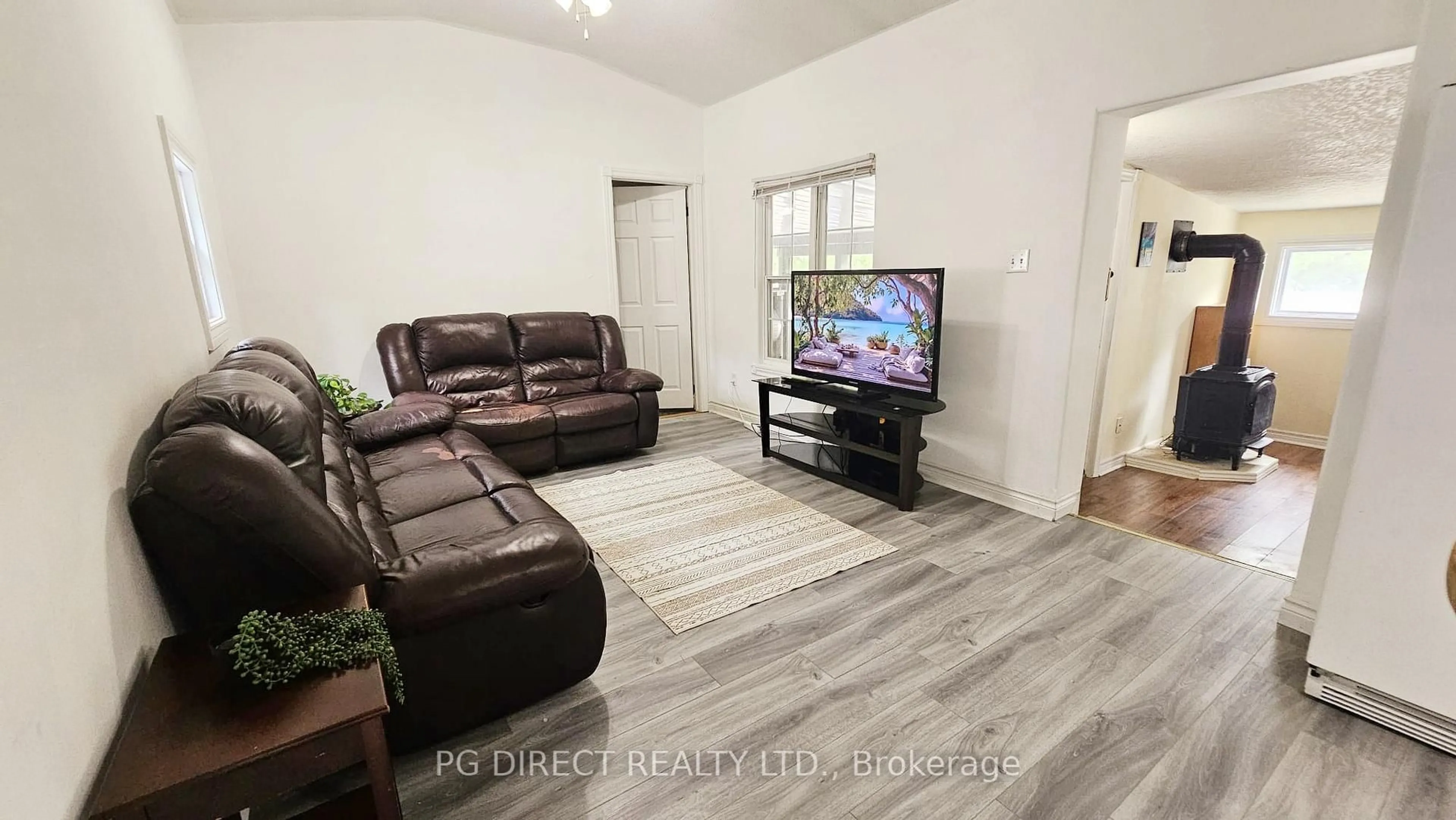 Living room with furniture, unknown for 2 Shamrock Cres, Essa Ontario L3W 0A5