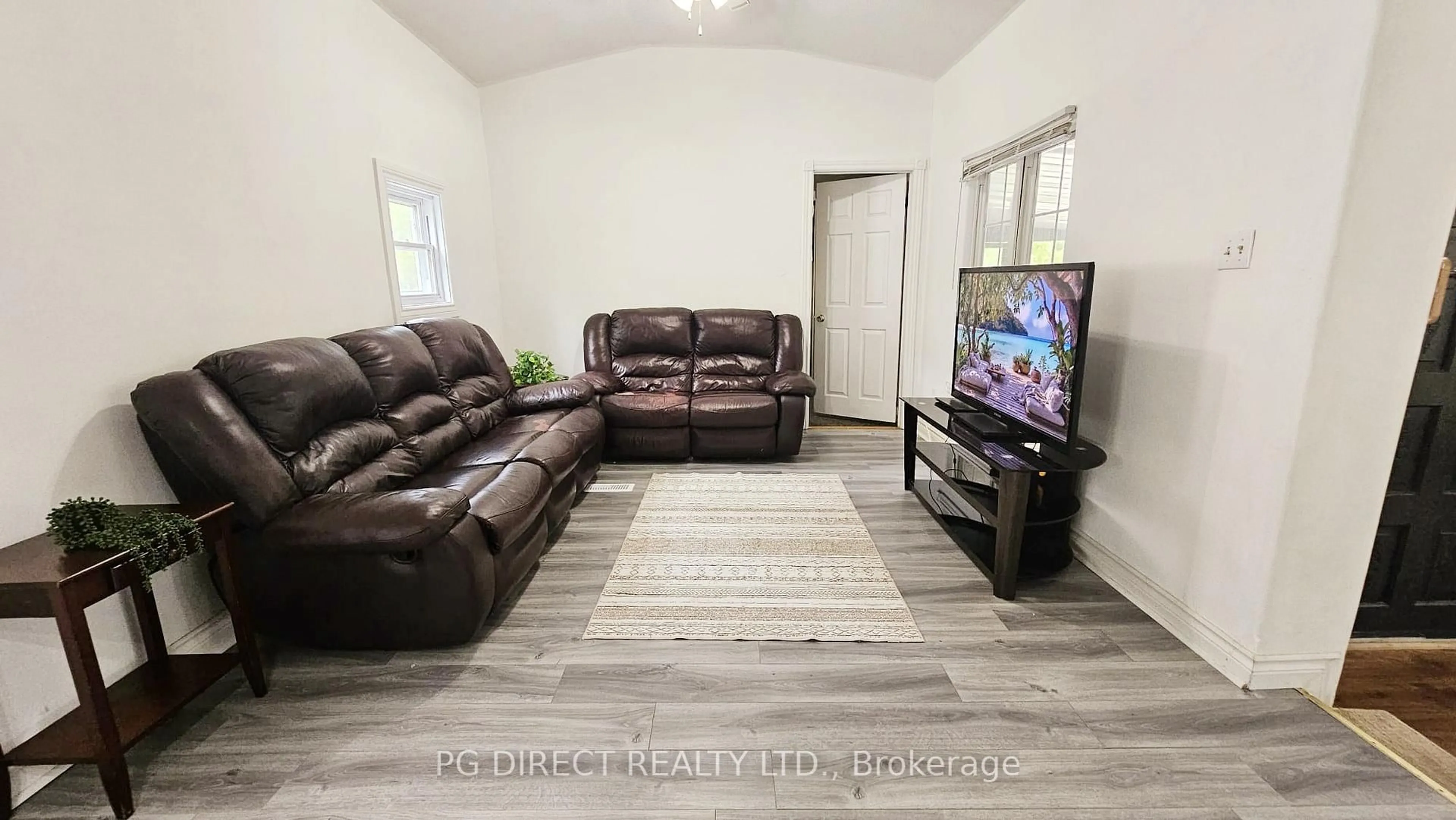 Living room with furniture, unknown for 2 Shamrock Cres, Essa Ontario L3W 0A5