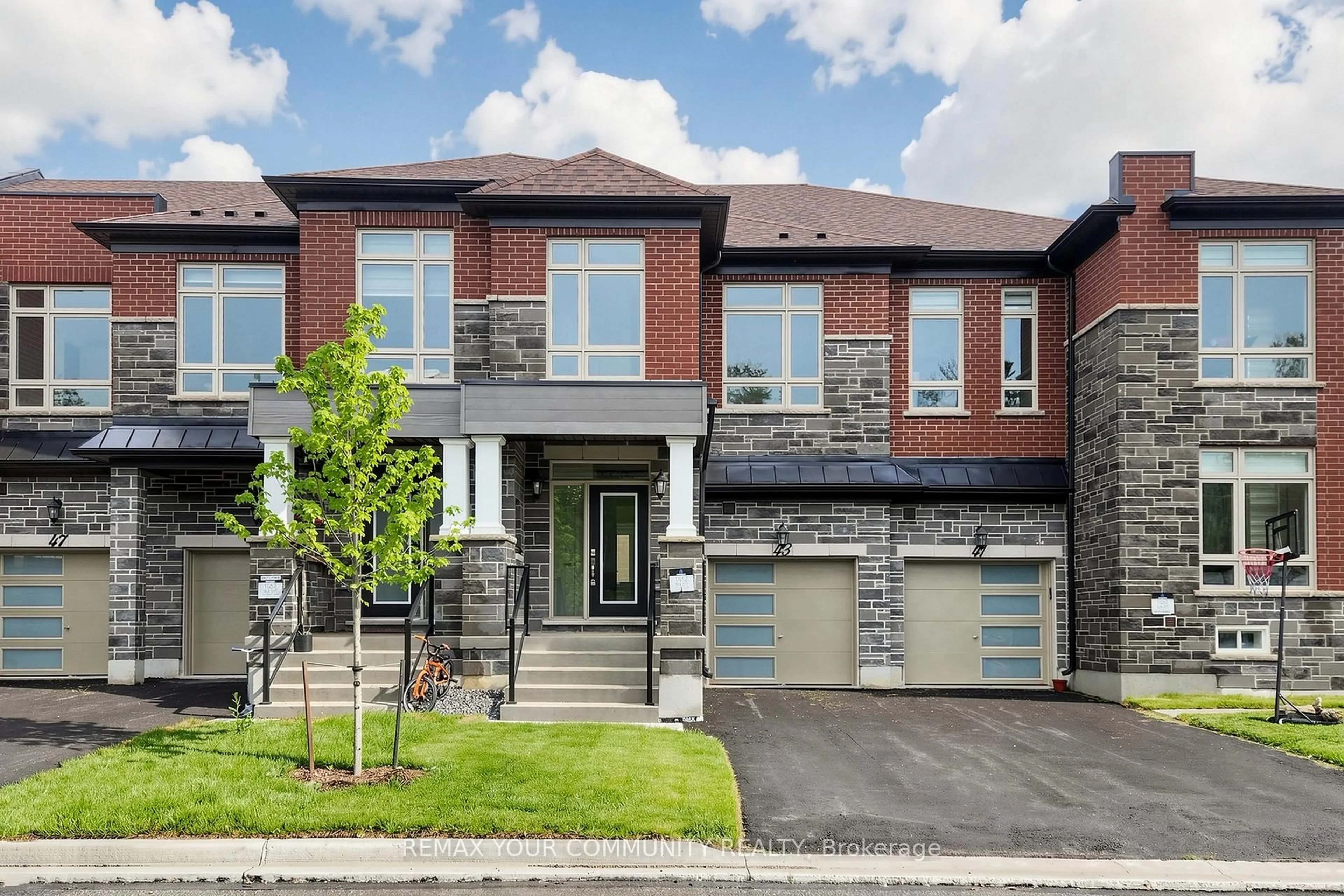 Home with brick exterior material, street for 43 Schmeltzer Cres, Richmond Hill Ontario L4E 1K9
