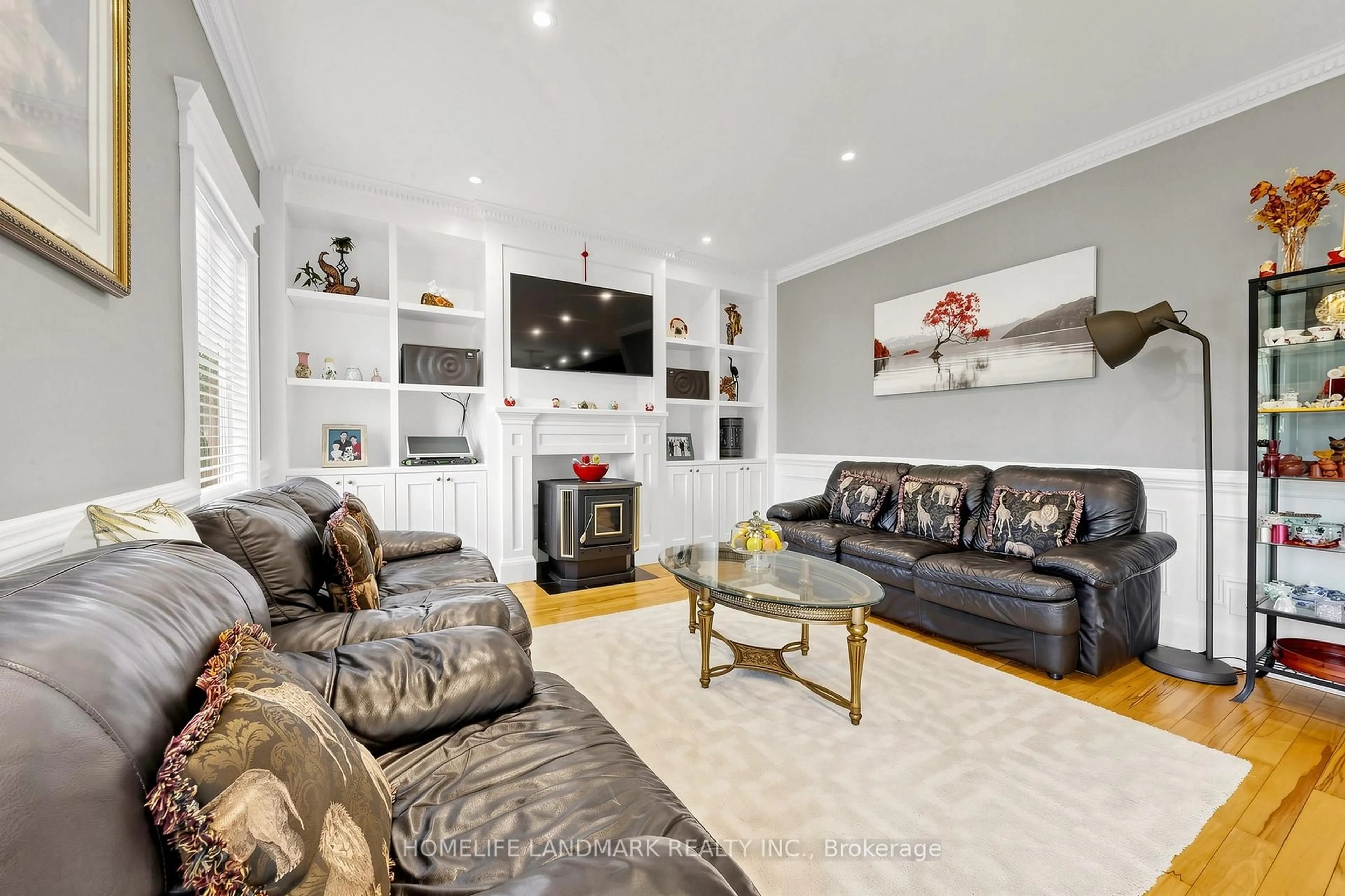 Living room with furniture, wood/laminate floor for 61 Irving Dr, Georgina Ontario L0E 1N0