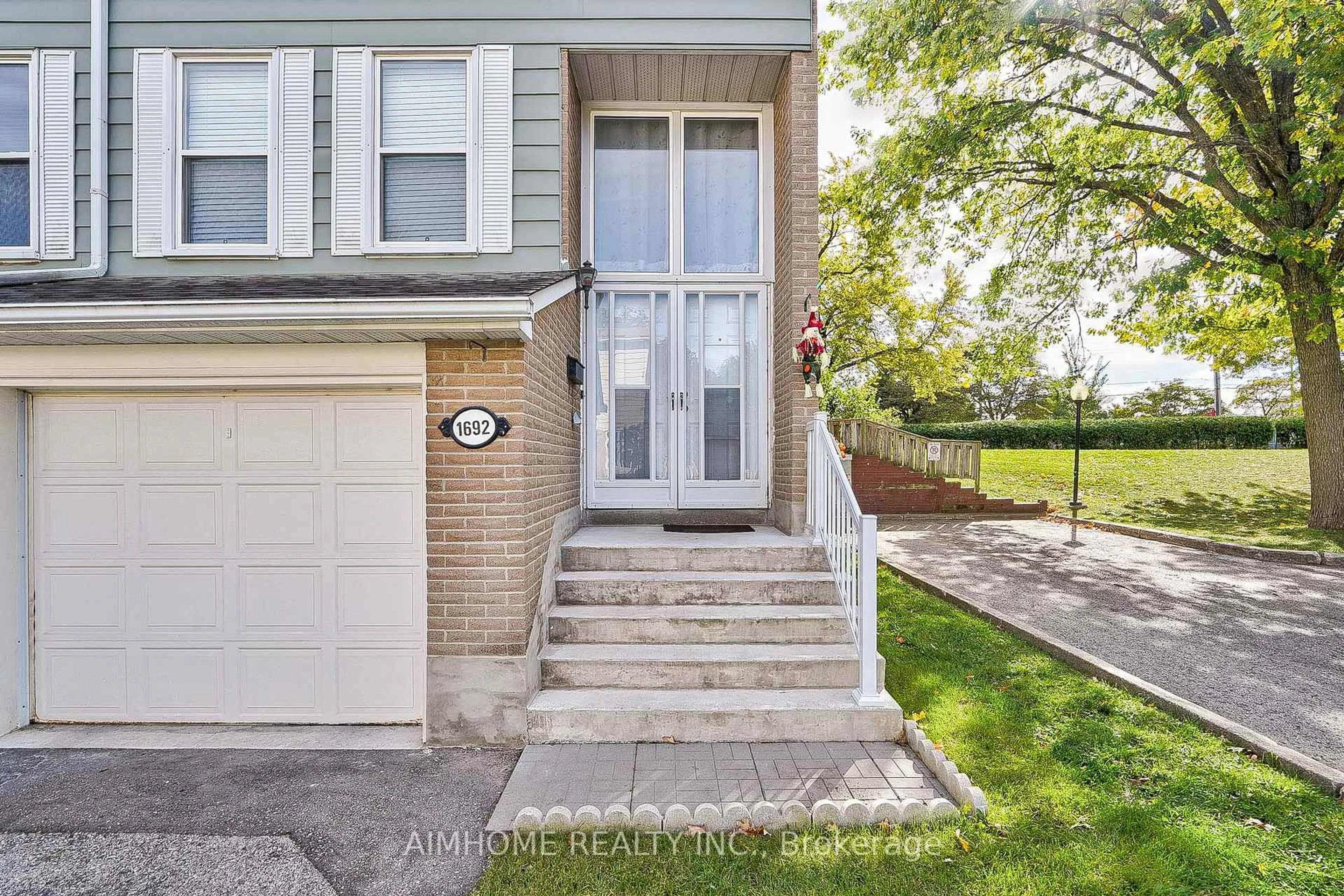 Home with brick exterior material, street for 1692 John St, Markham Ontario L3T 1Y9