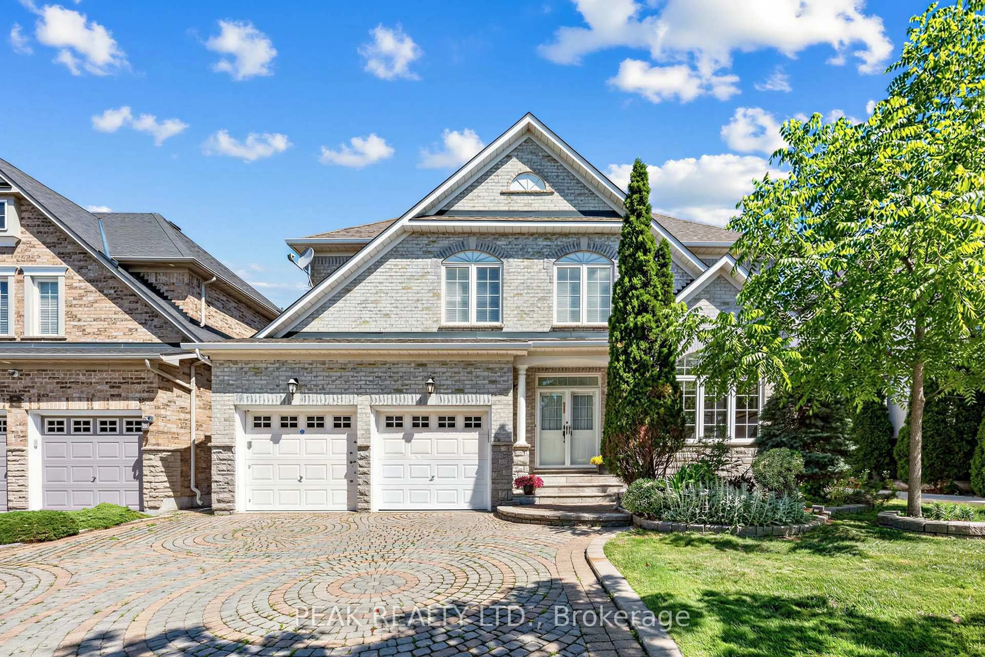 Home with brick exterior material, street for 66 Hollylane Dr, Markham Ontario L6C 2J9