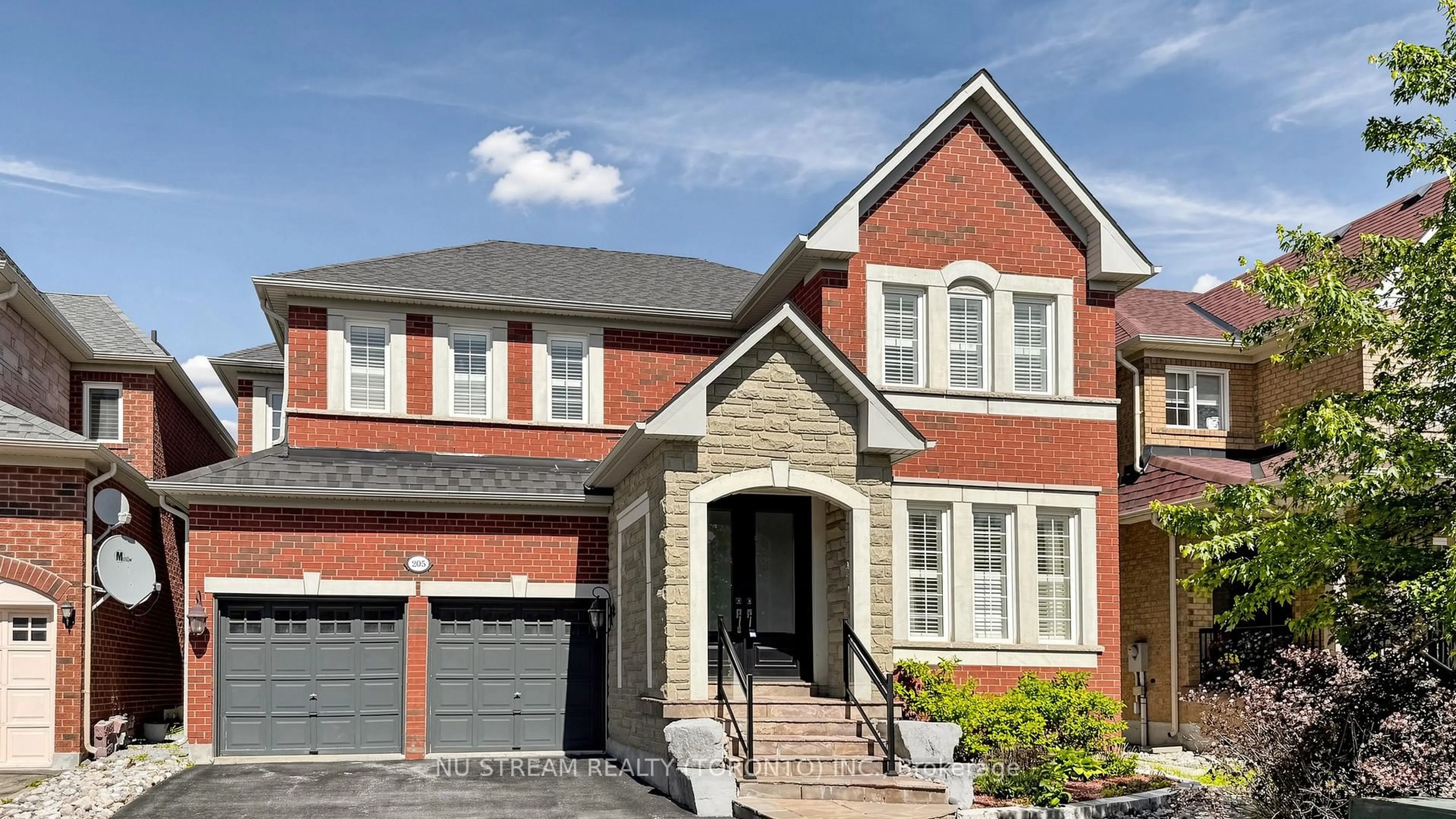 Home with brick exterior material, street for 205 Fred Mclaren Blvd, Markham Ontario L6E 1H2