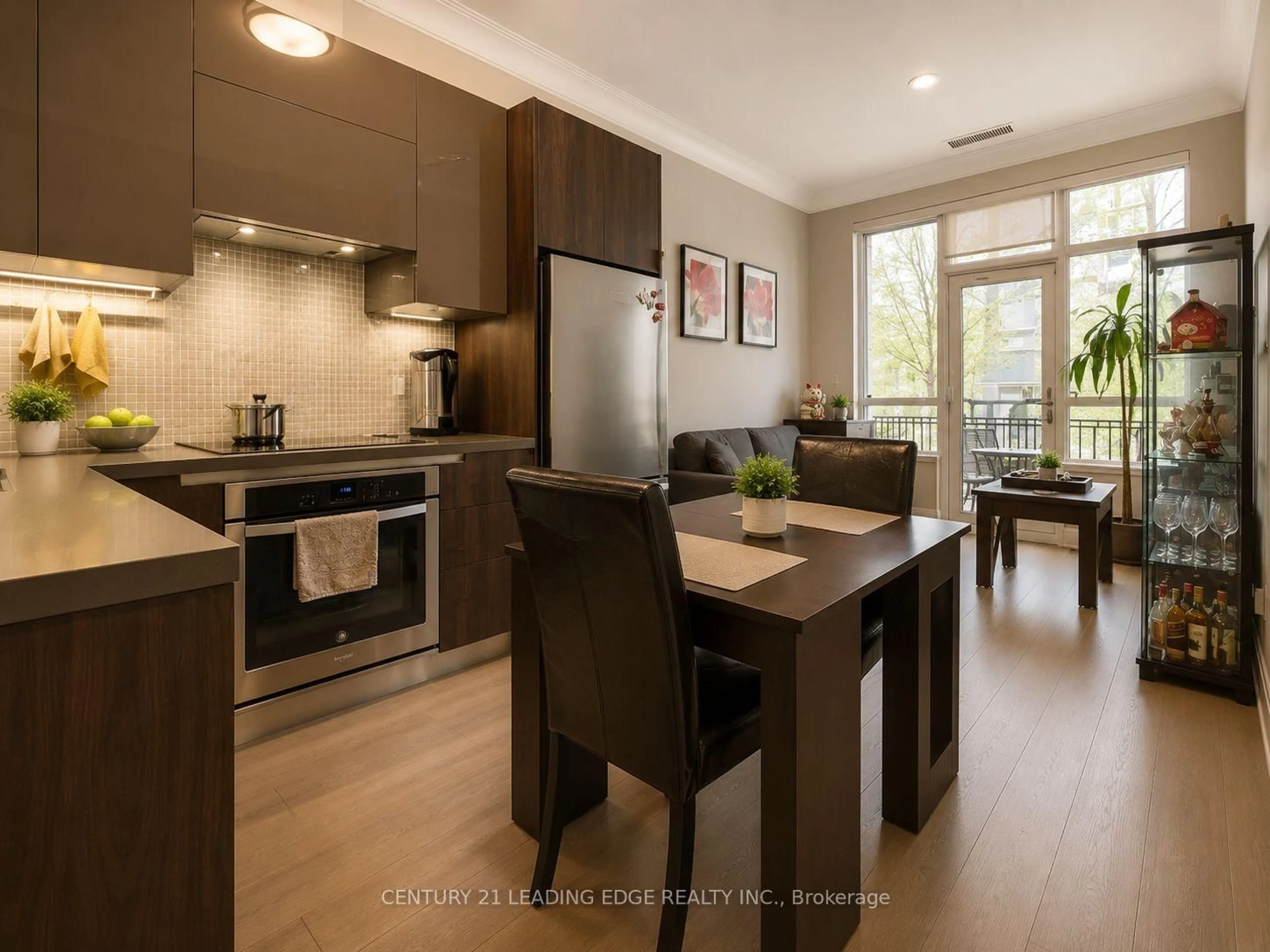 Open concept kitchen, wood/laminate floor for 25 Water Walk Dr #121, Markham Ontario L6G 0G3