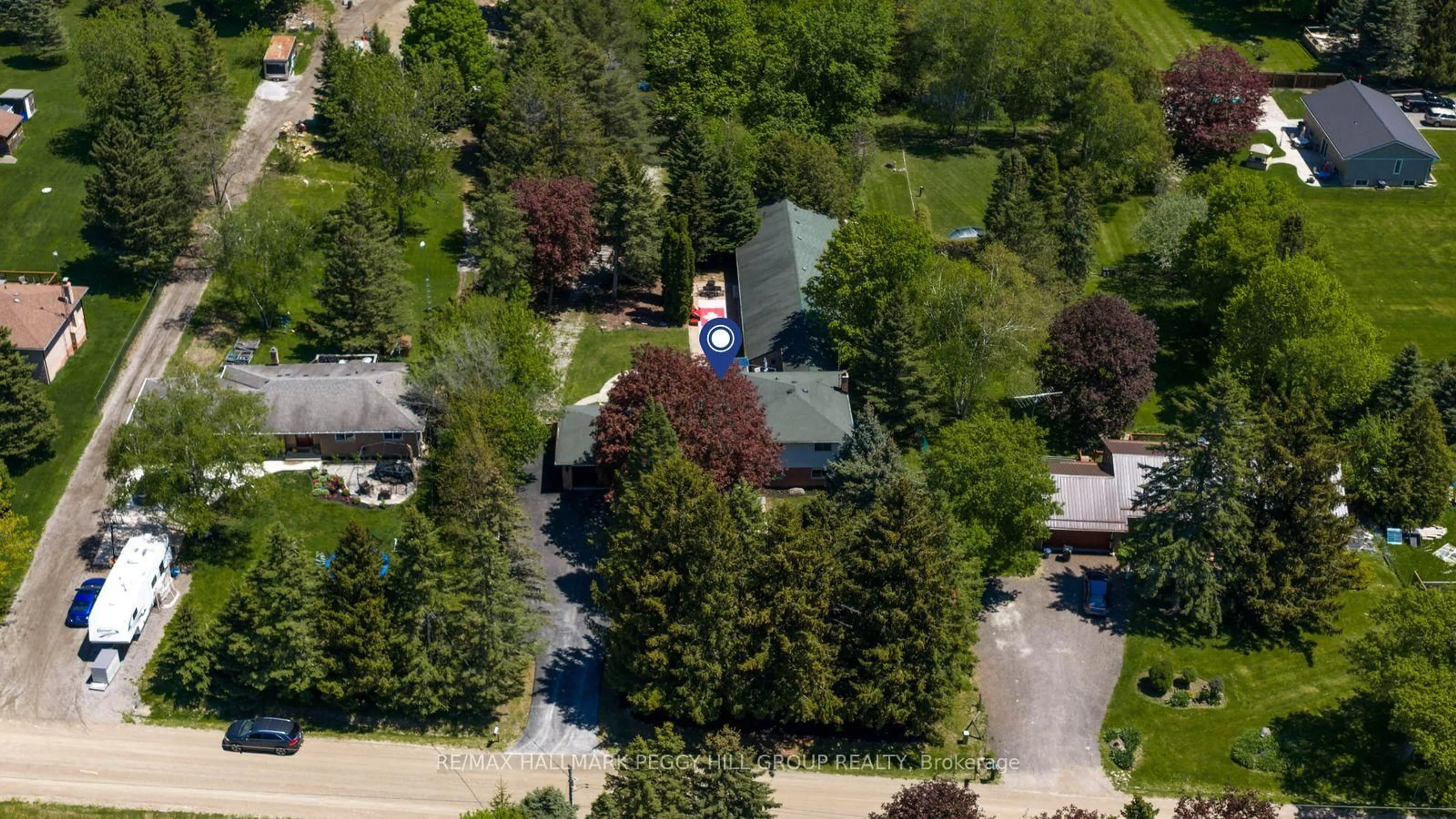 A pic from outside/outdoor area/front of a property/back of a property/a pic from drone, street for 2145 18th Sdrd, New Tecumseth Ontario L0G 1W0