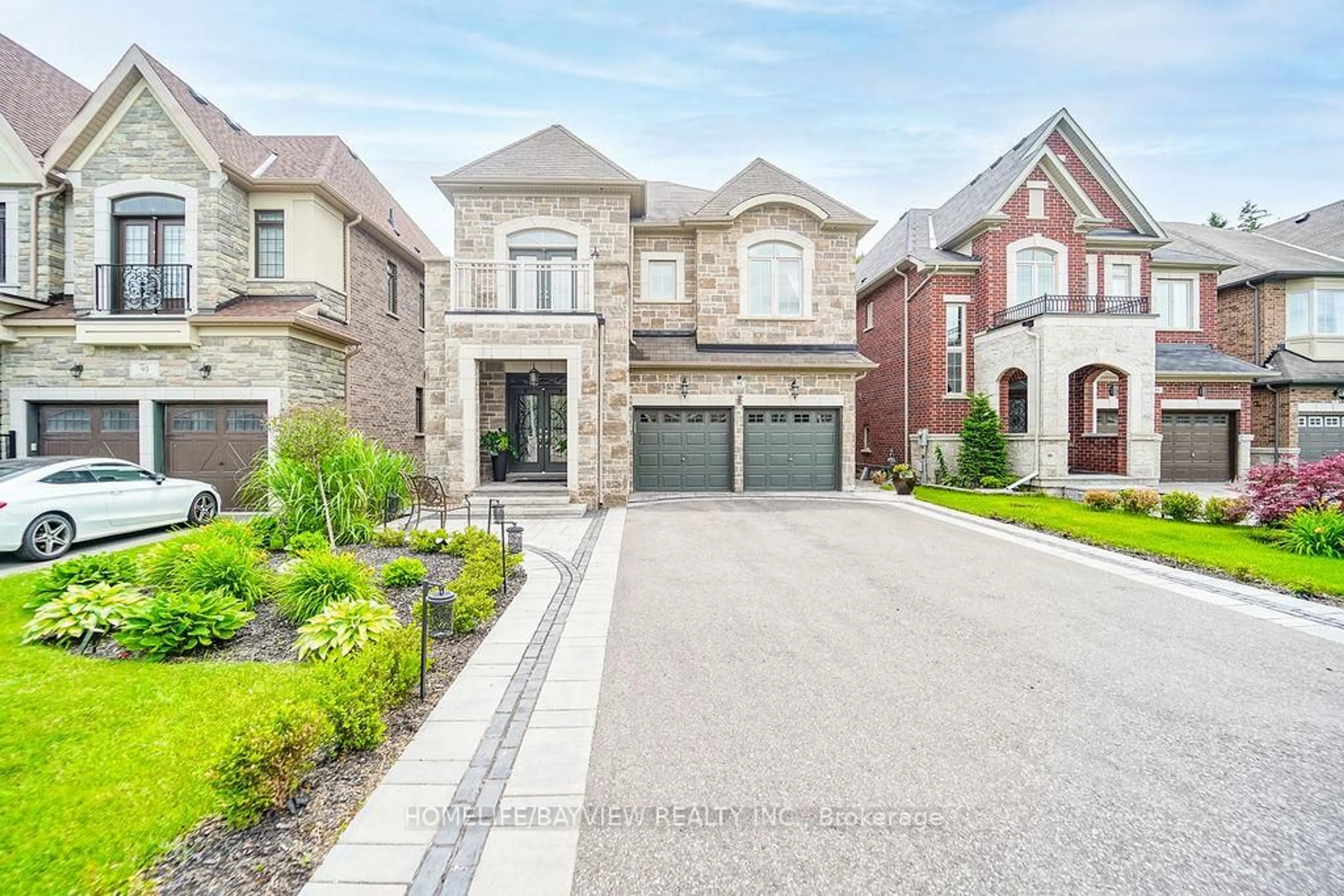 Home with brick exterior material, street for 91 Marbrook St, Richmond Hill Ontario L4C 0Y8