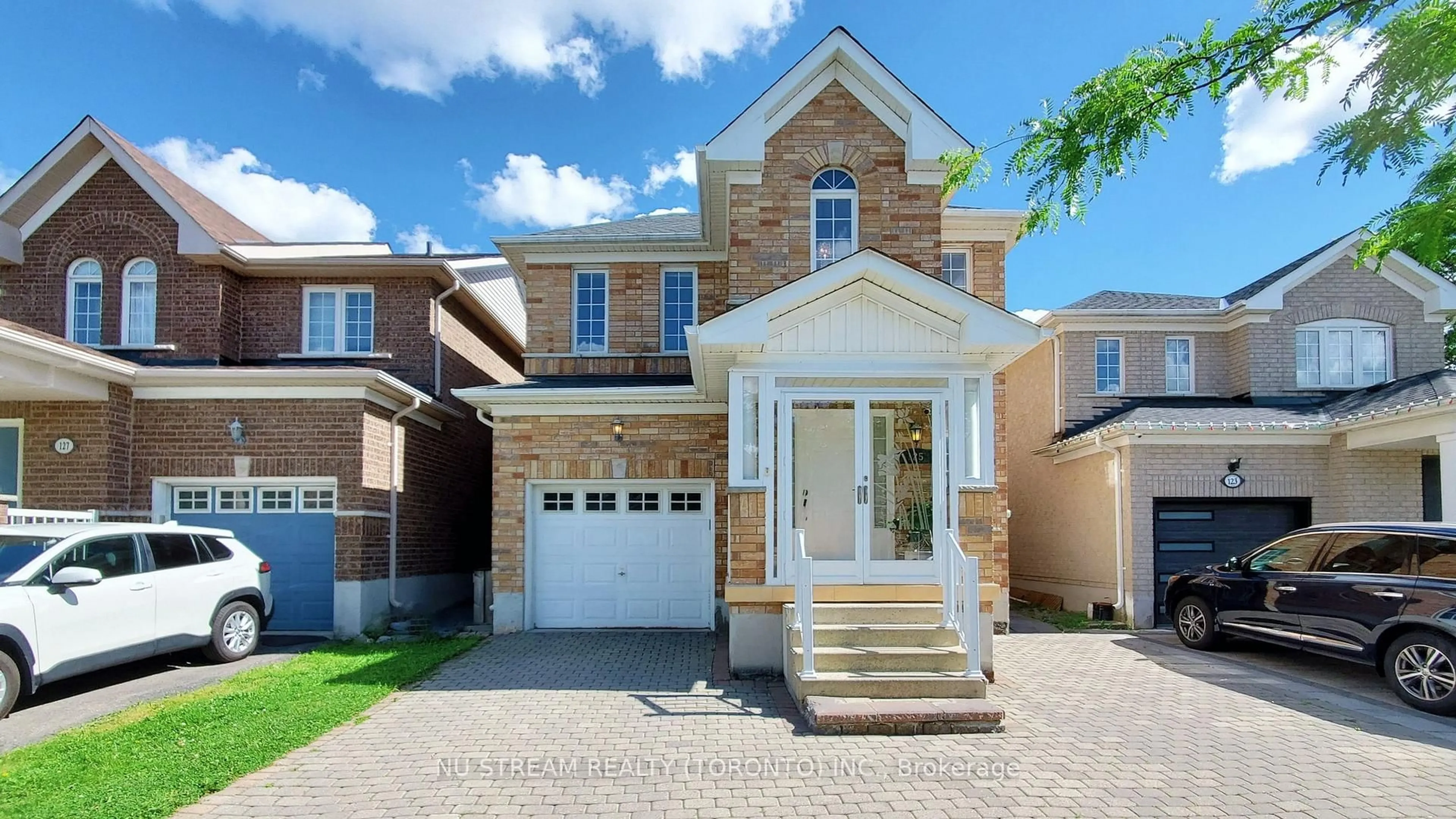 Home with brick exterior material, street for 125 Peshawar Ave, Markham Ontario L3R 4R1
