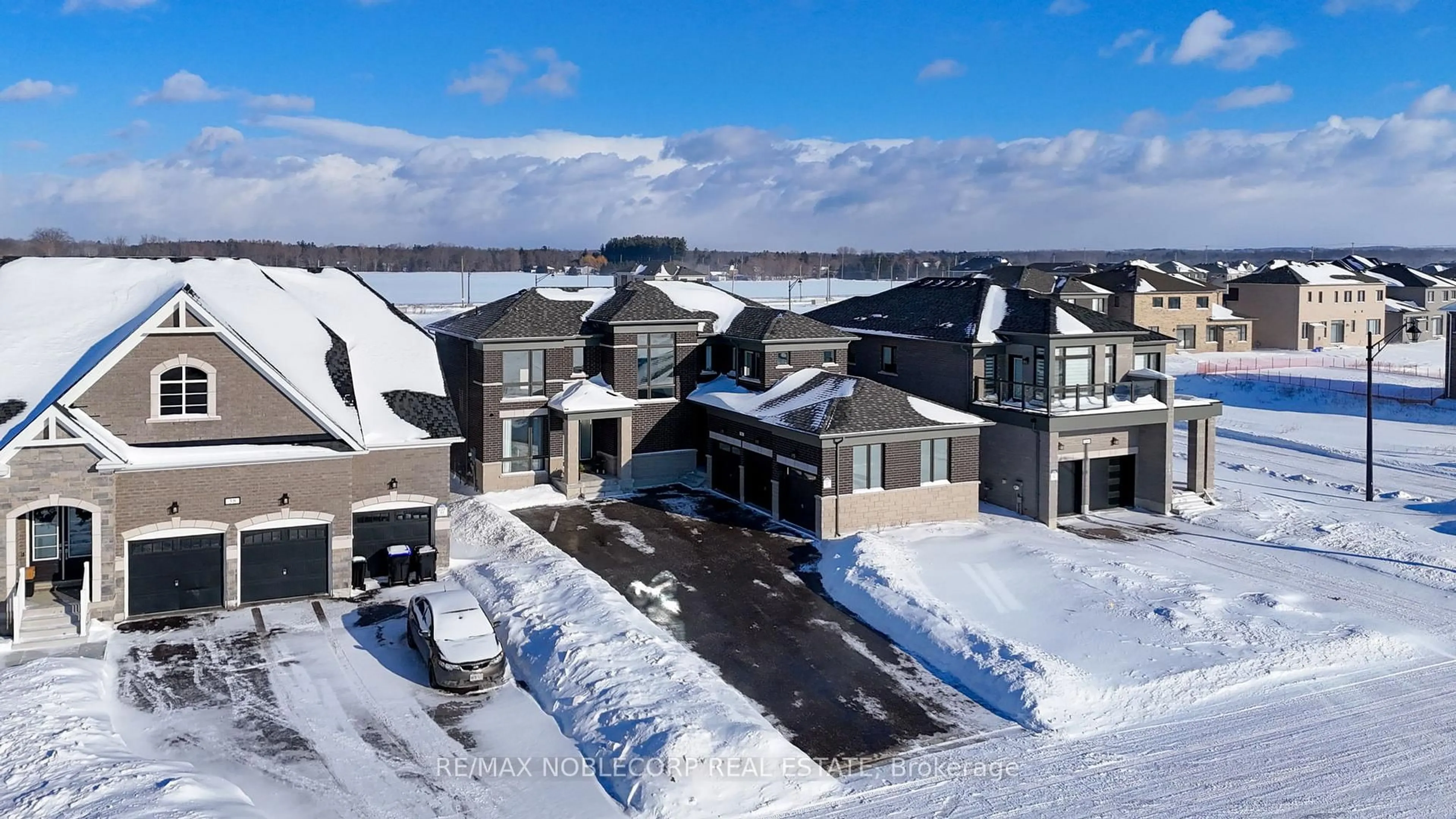 A pic from outside/outdoor area/front of a property/back of a property/a pic from drone, mountain view for 36 Felhazi Tr, Essa Ontario L3W 0A4
