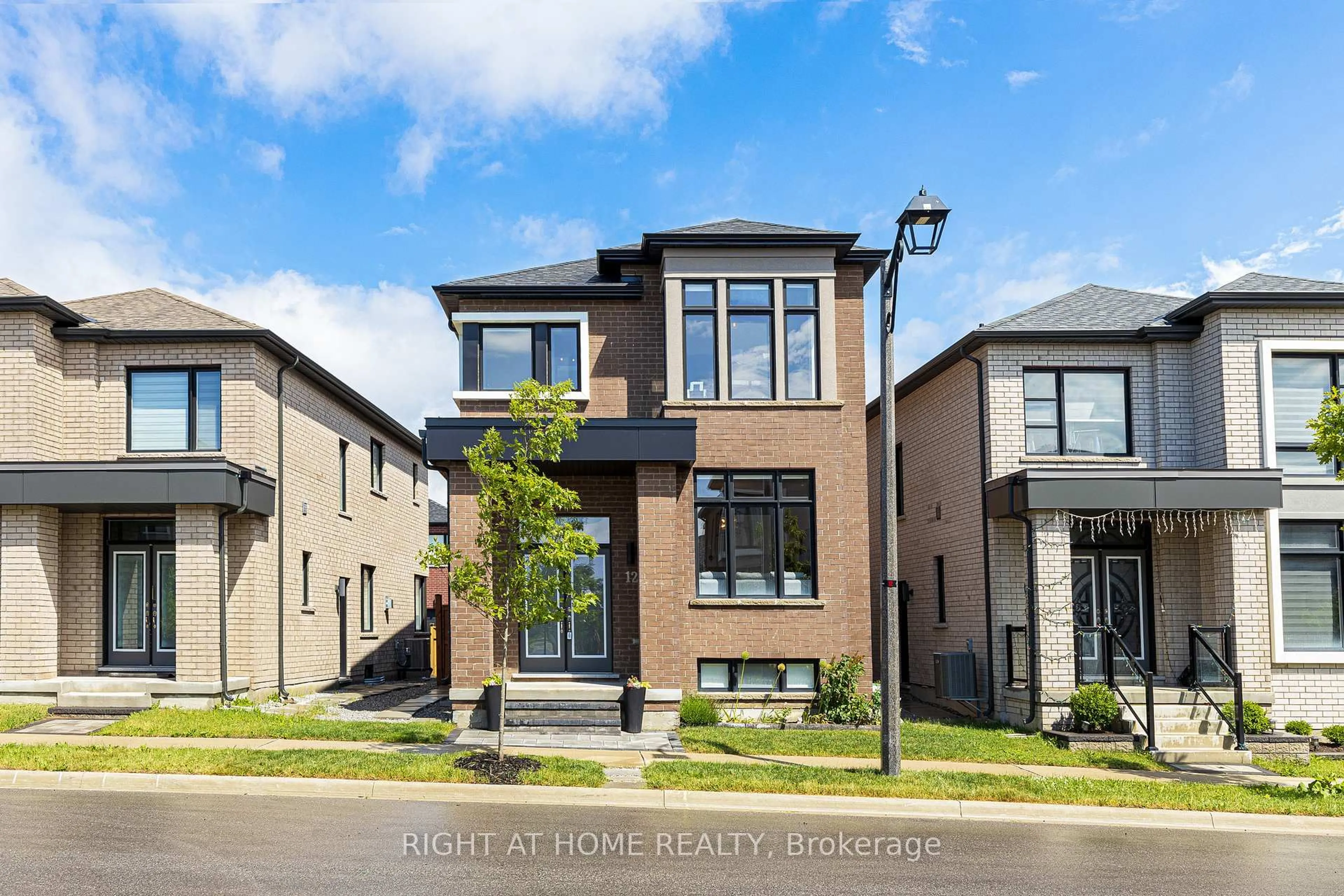 Home with brick exterior material, street for 12 Sam Priestley Ave, Markham Ontario L6B 1P1
