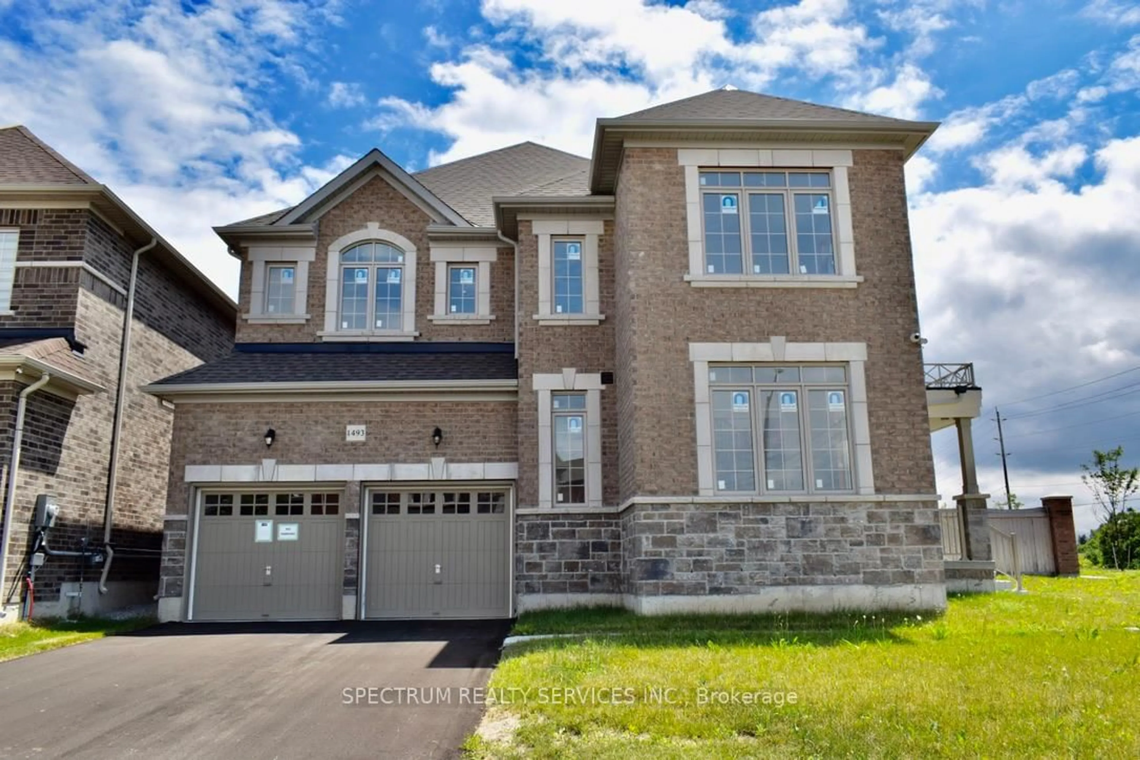 Home with brick exterior material, street for 1493 Tomkins Rd, Innisfil Ontario L9S 0M8