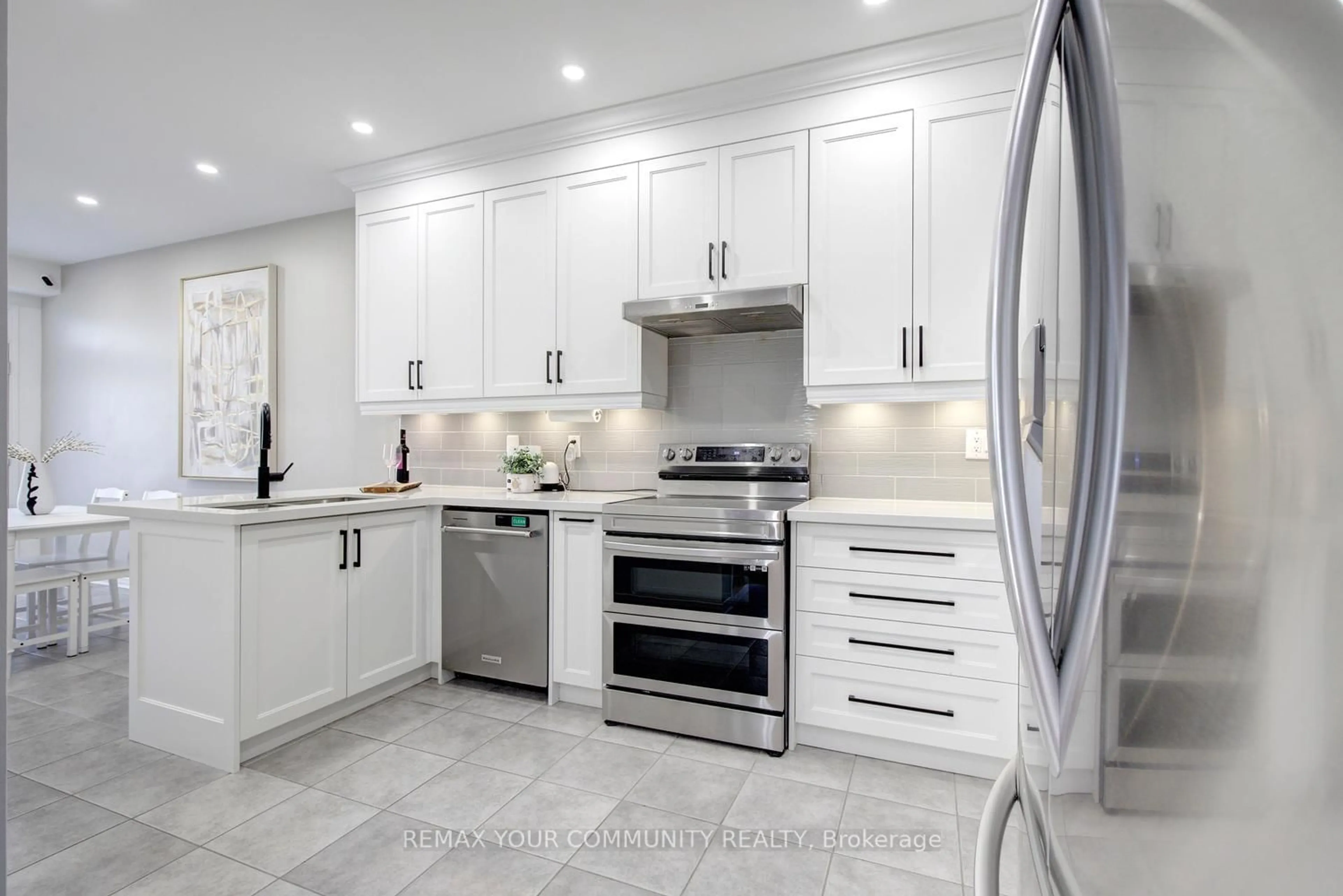 Contemporary kitchen, ceramic/tile floor for 42 Laramie Cres, Vaughan Ontario L6A 0P8