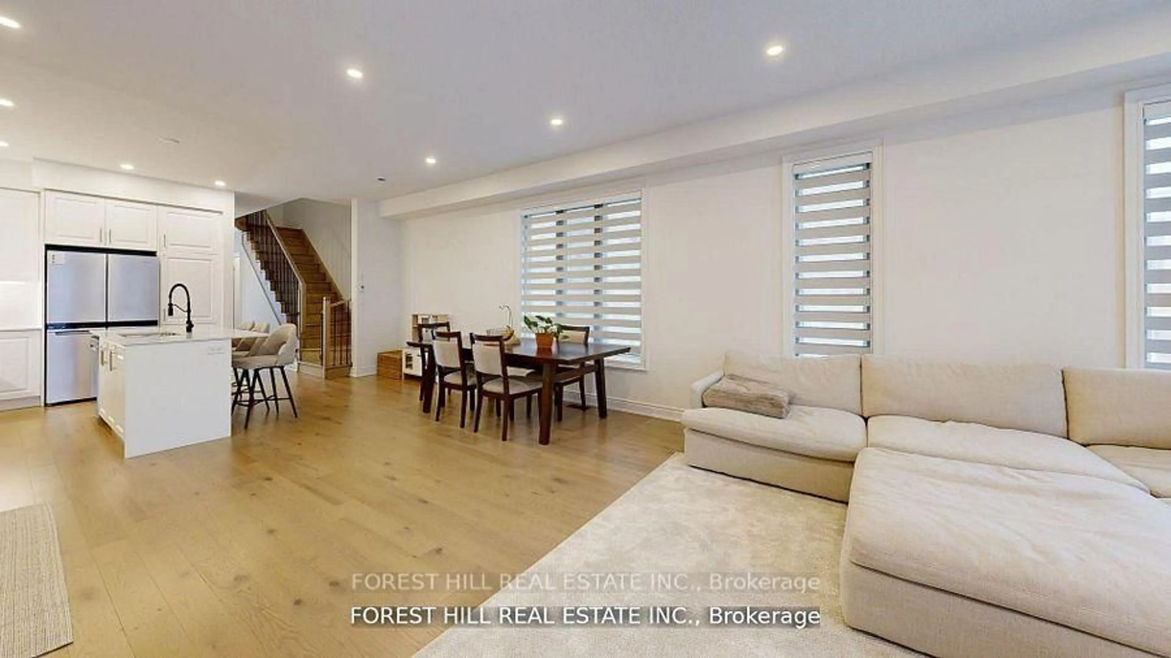 Living room with furniture, wood/laminate floor for 54 Montrose Blvd, Bradford West Gwillimbury Ontario L3Z 4P3