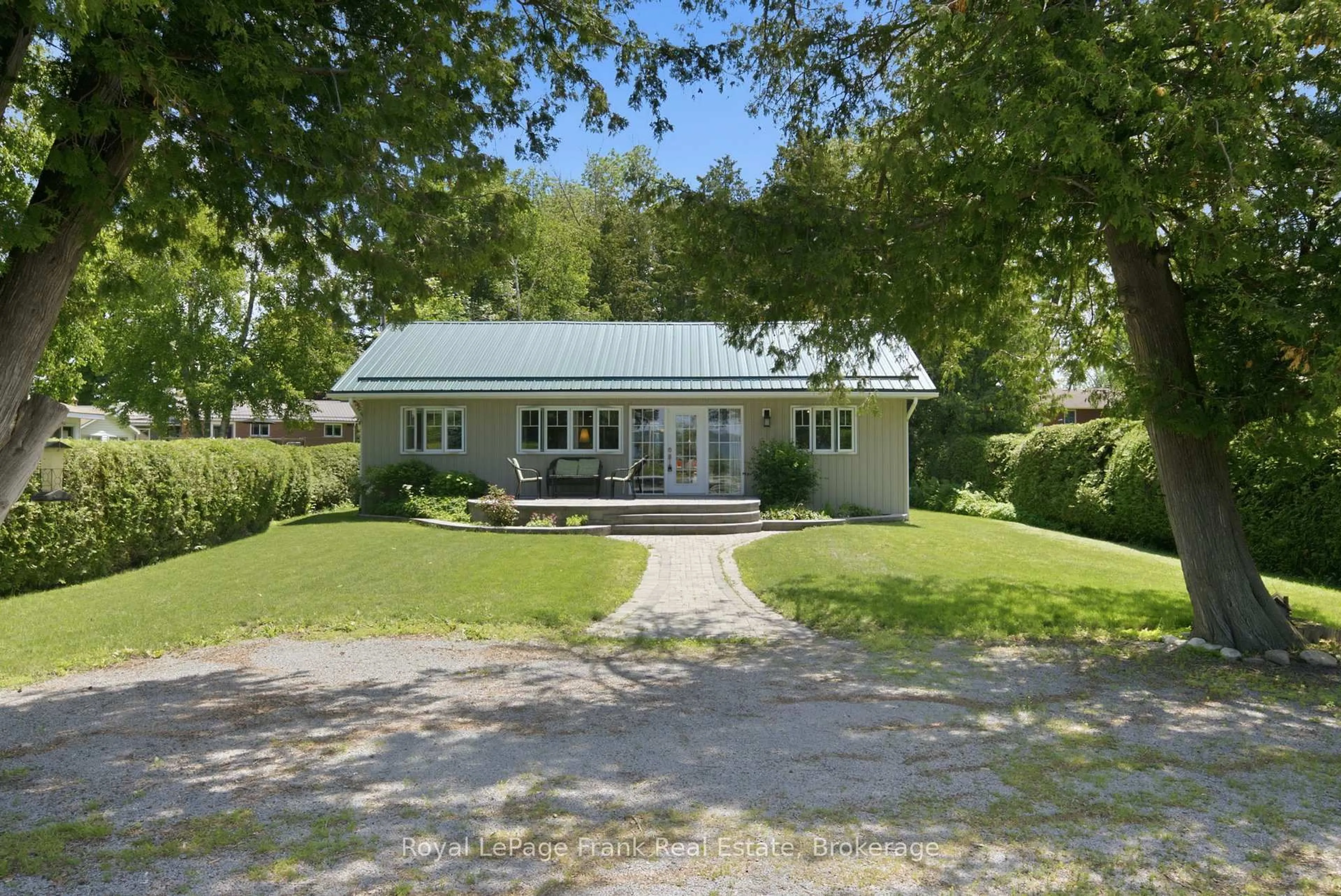 A pic from outside/outdoor area/front of a property/back of a property/a pic from drone, unknown for 15 Lakeshore Rd, Brock Ontario L0K 1A0
